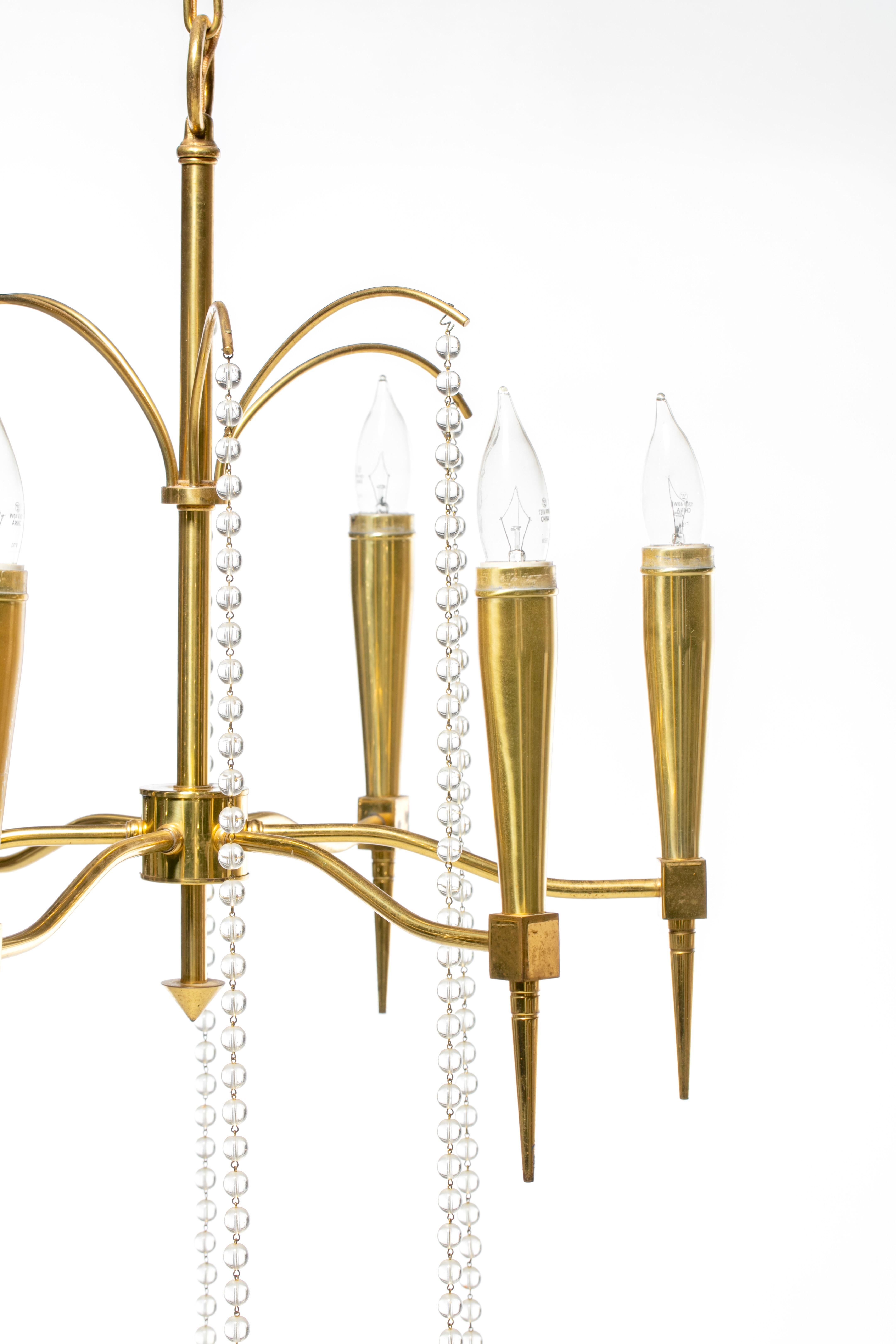 Tommi Parzinger Hollywood Regency Chandelier of Flowing Crystals and Brass For Sale 7