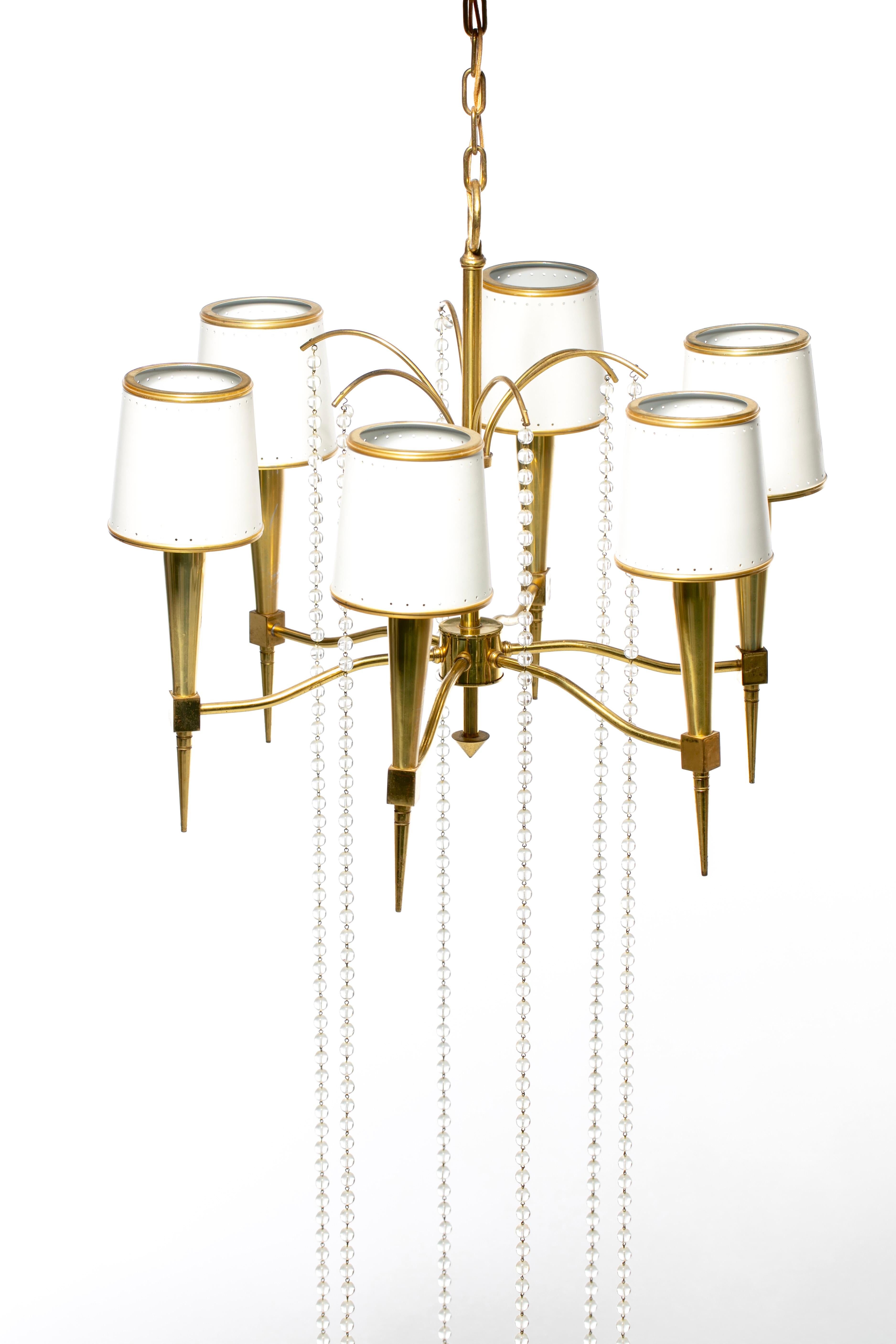 Tommi Parzinger Hollywood Regency Chandelier of Flowing Crystals and Brass In Good Condition For Sale In Saint Louis, MO