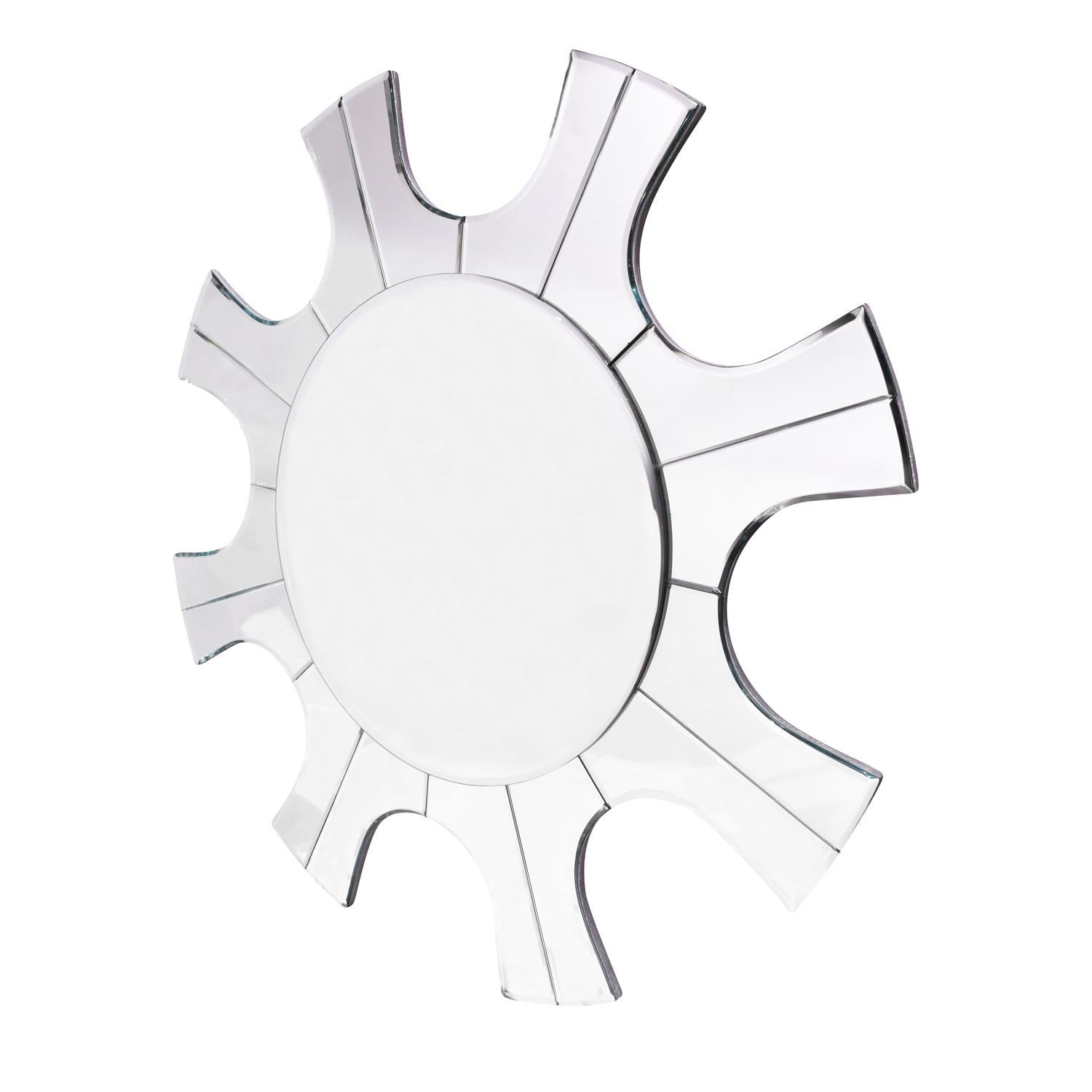 Sculptural mirror model 507, radiating sun design, by Tommi Parzinger for Parzinger Originals, American 1950s. This design showcases the elegance that Tommi Parzinger is famous for.

Reference:
Parzinger Originals paper catalog published in the