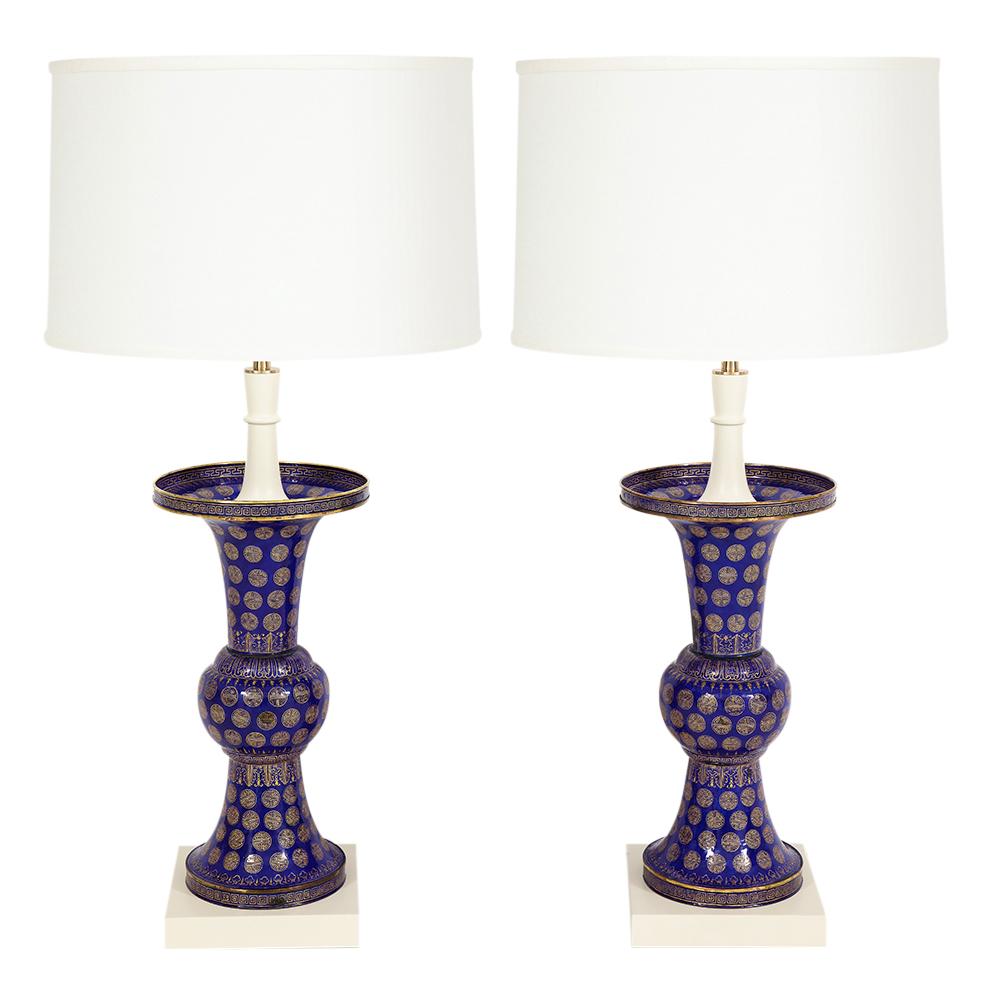 Tommi Parzinger table lamps, Chinese cloisonné, enameled brass, signed. Parzinger selected these cobalt blue 19th Century Qing Dynasty cloisonné brass baluster vases to be repurposed as lamps in the Ocean, New Jersey home of Nathan and Janet