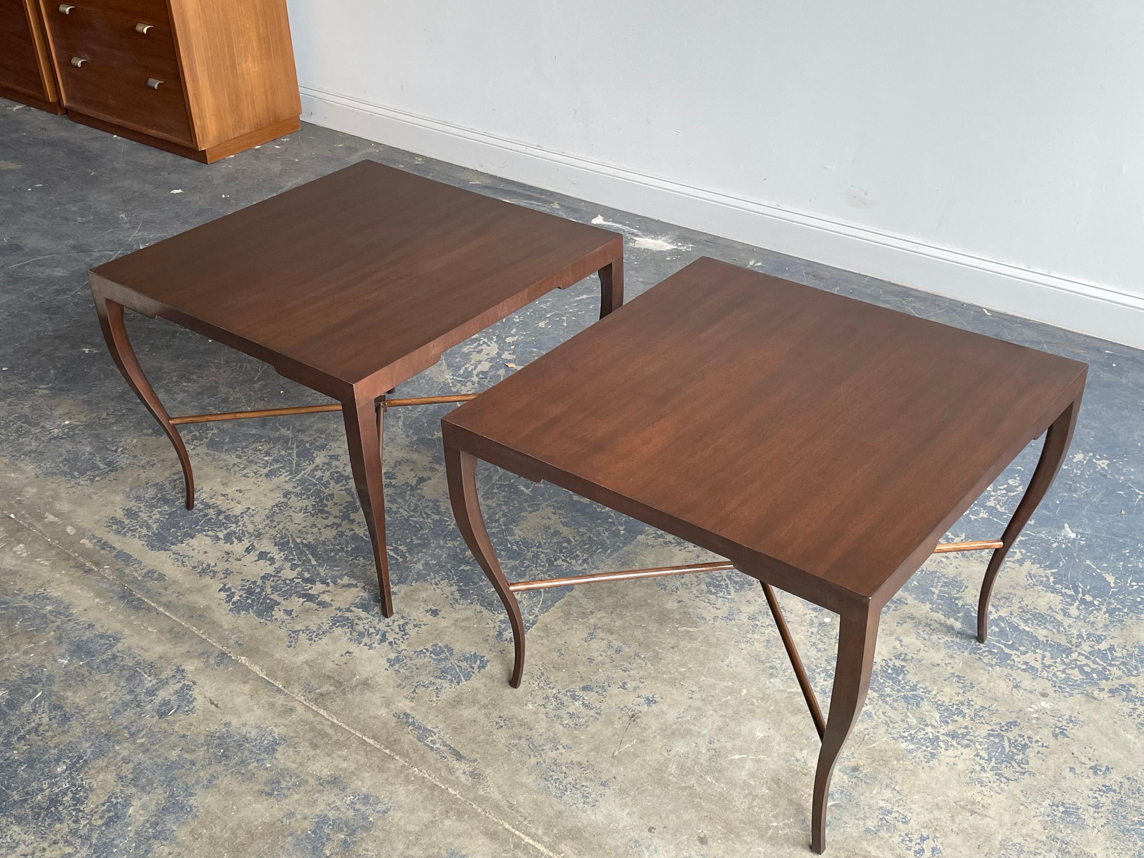 Rare pair of large scale end tables designed by Tommi Parzinger. Tables feature elegant curved legs and a beautiful top. Model #209. Great styling cues reminiscent of T.H. Robsjohn-Gibbings, Edward Wormley, Karl Springer, Harvey Probber, etc.