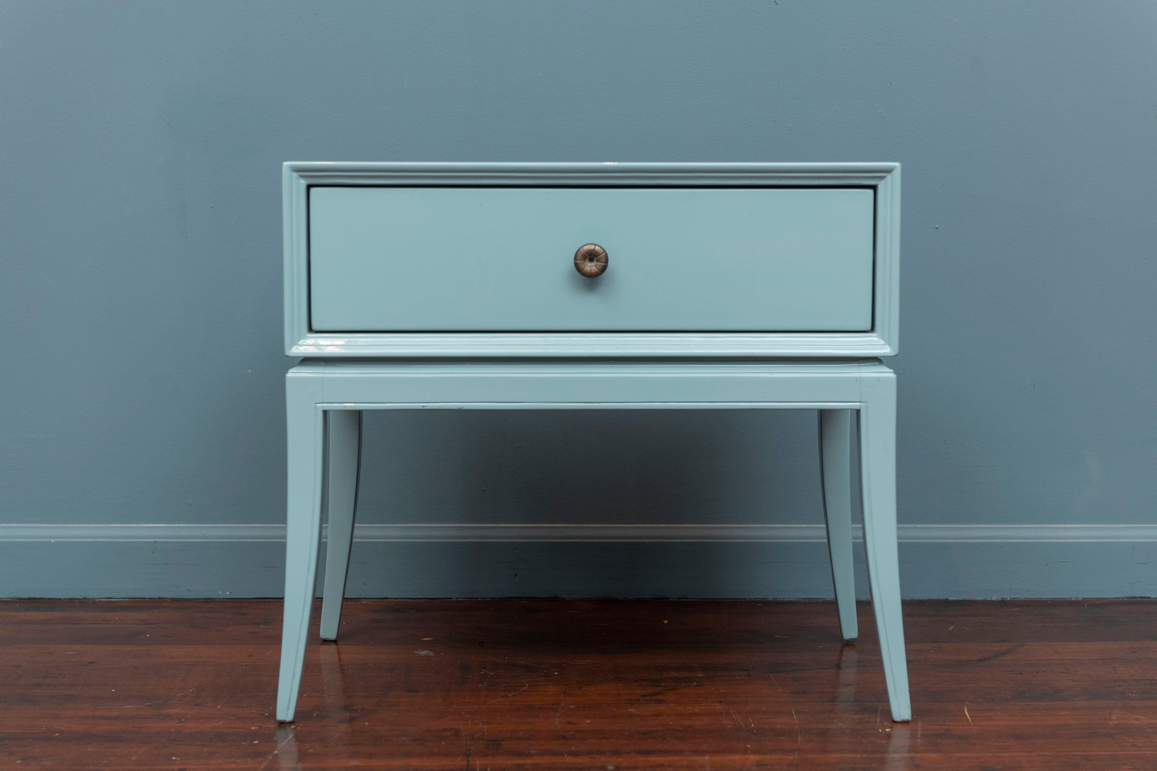 Tommi Parzinger design single drawer nightstand for Charak Furniture. Recently lacquered in a beautiful light blue with Parzinger's signature brass detail hardware and a refined profile.