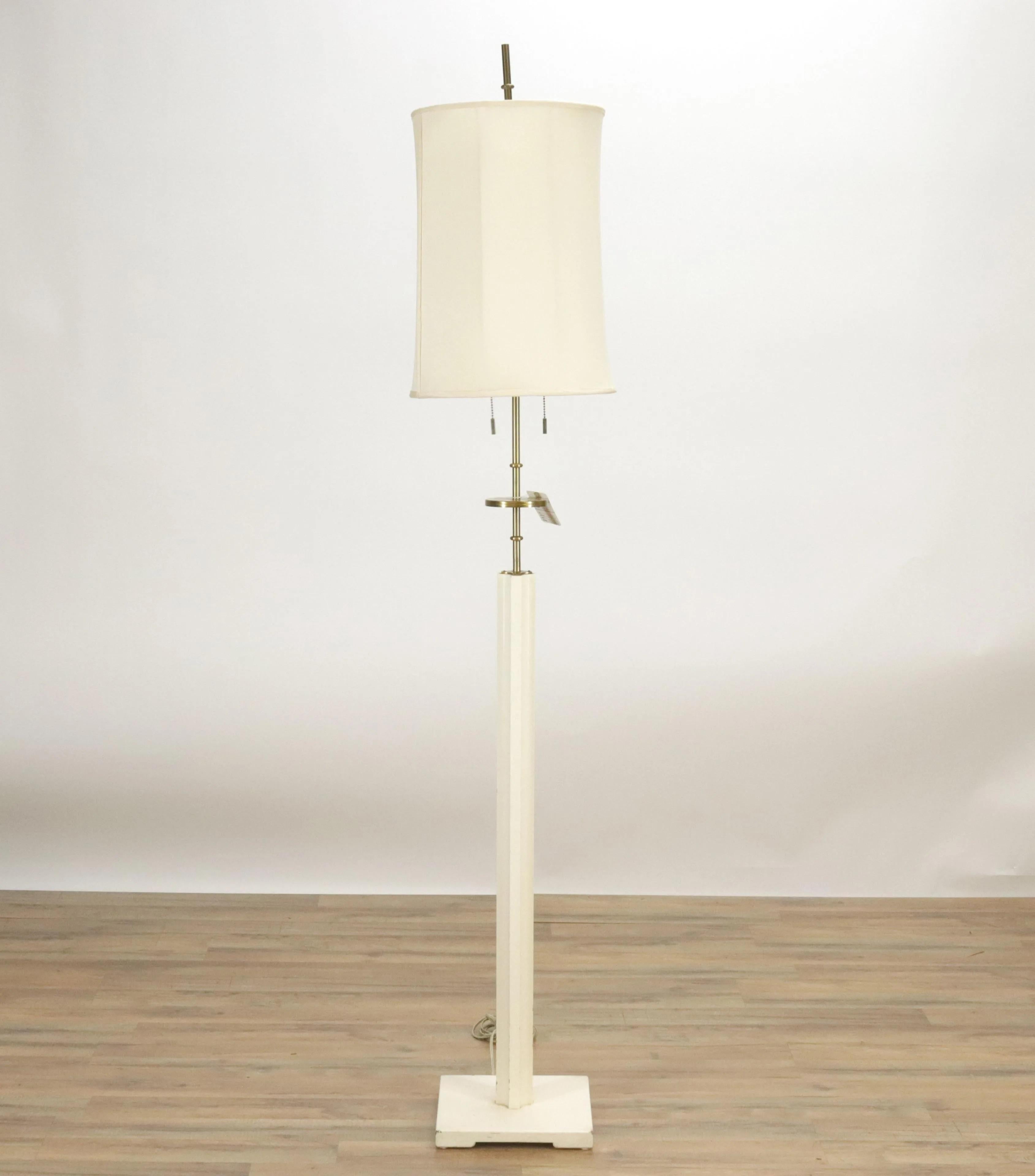 Tommi Parzinger brass & wood floor lamp. Copy of the original purchased receipt included from Parzinger Originals Inc., dated January 15, 1958 
 Dimensions: 70