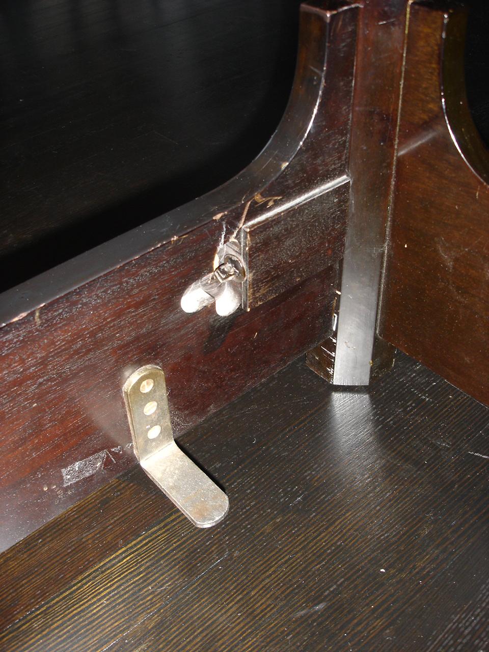 A four poster ebonized mahogany bed by Tommi Paringer Originals. An extremely rare design with tapered posts with inset panels and carved mahogany crown motif finials, a Parzinger trademark,
United States,
1950s.