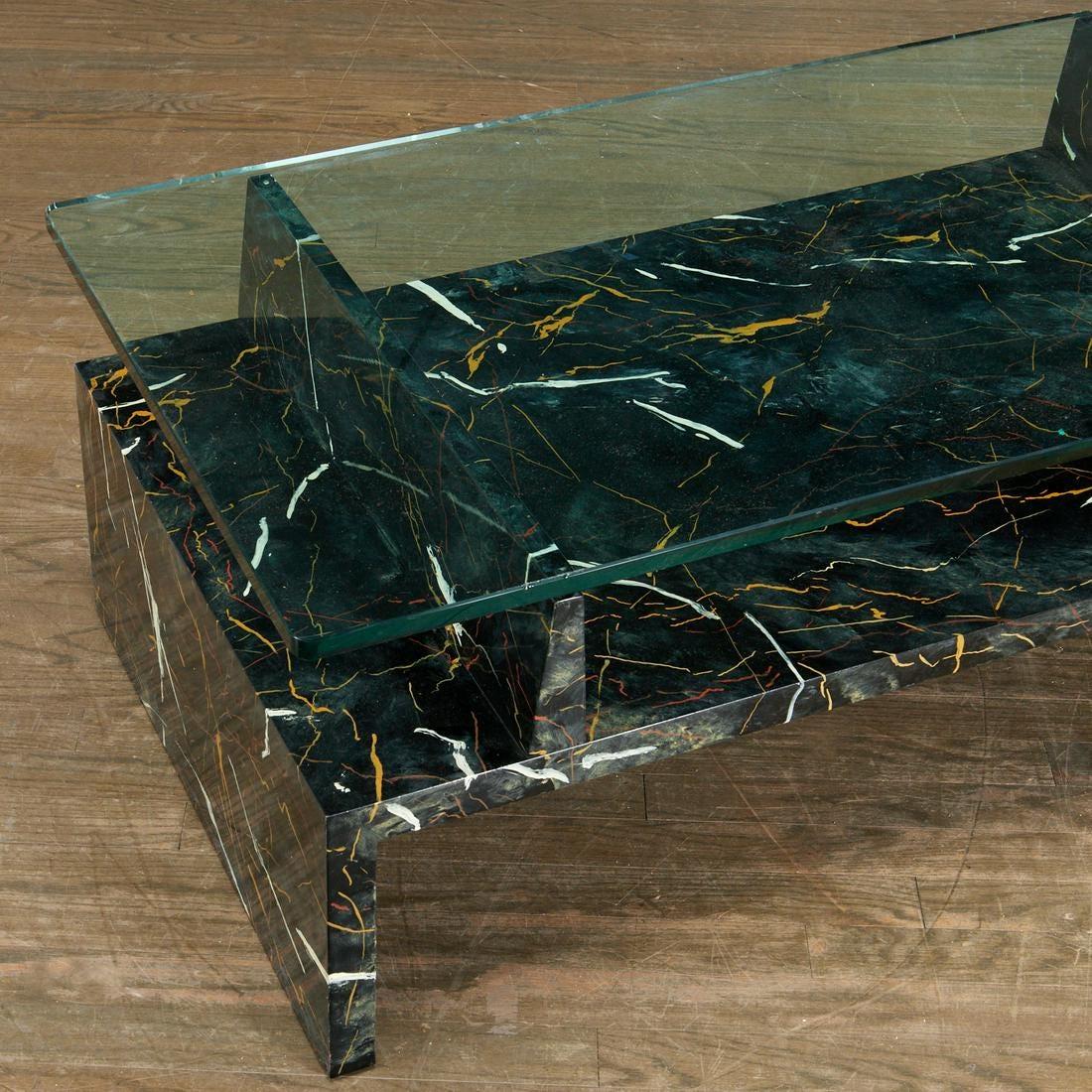 Tommi Parzinger painted faux marble coffee table. The table is lacquered wood with a 3/4 inch thick glass top. Stamped 