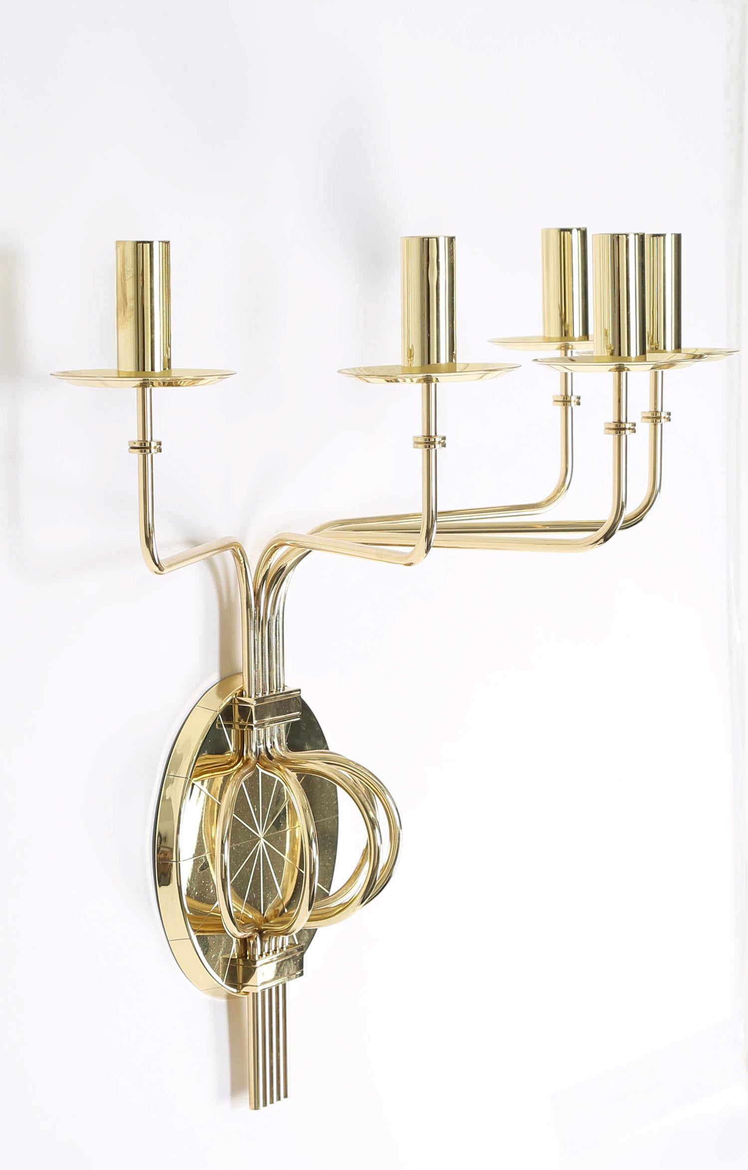 Hand-Crafted Tommi Parzinger Pair of Impressive 5 Arm Wall Sconces in Polished Brass, 1950s For Sale
