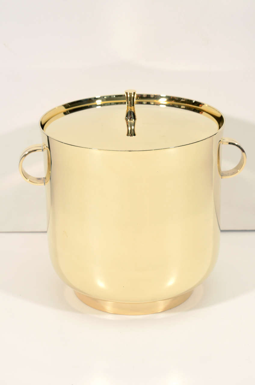 Modern simplistic sophisticated polished brass ice bucket with mercury glass liner, designed by Tommi Parzinger.