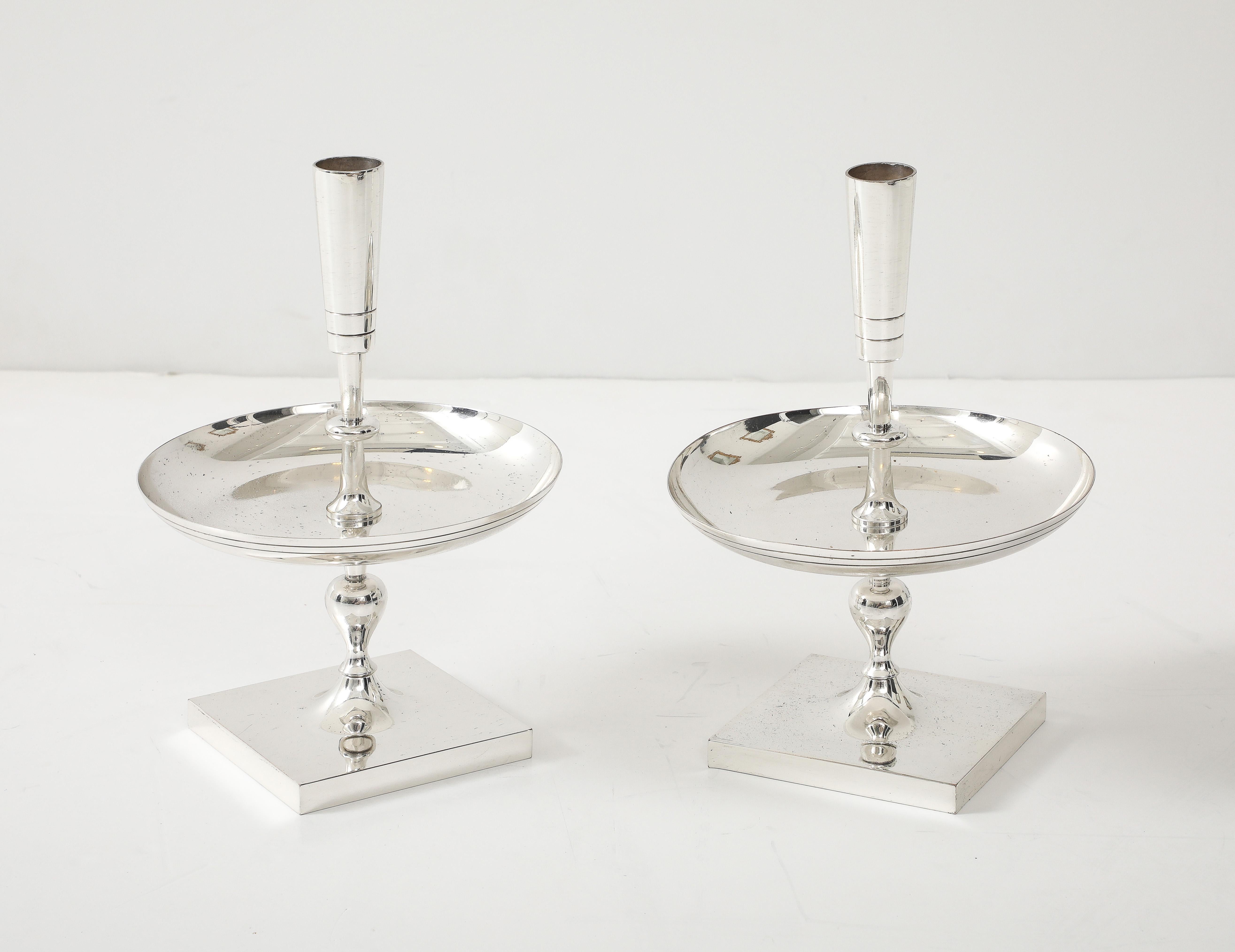 Mid-Century Modern Tommi Parzinger Polished Nickel Candlesticks For Sale