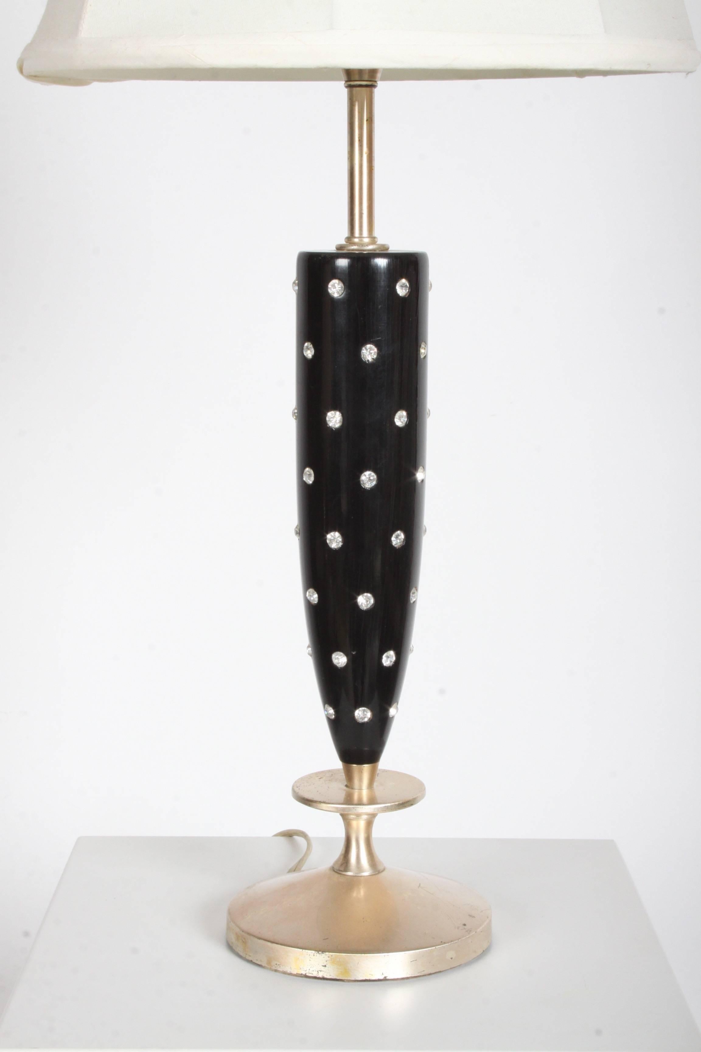 Attributed to Tommi Parzinger Rhinestone studded lamp for Rembrandt. Black lacquer with embedded rhinestones and silver plated base. Vintage shade not included. Mid-Century Modern. Shade shown is 12