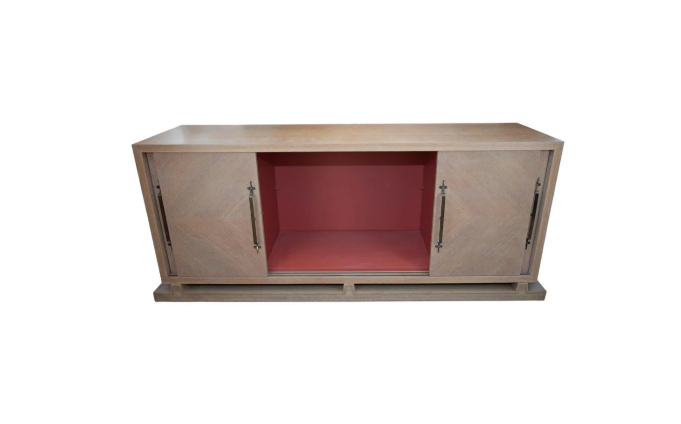 Tommi Parzinger Ceruse Finish credenza
A great early form on a sophisticated Plynth base.
Original lacquered interior.
The home this was in was featured in a 1956 House beautiful cover story.