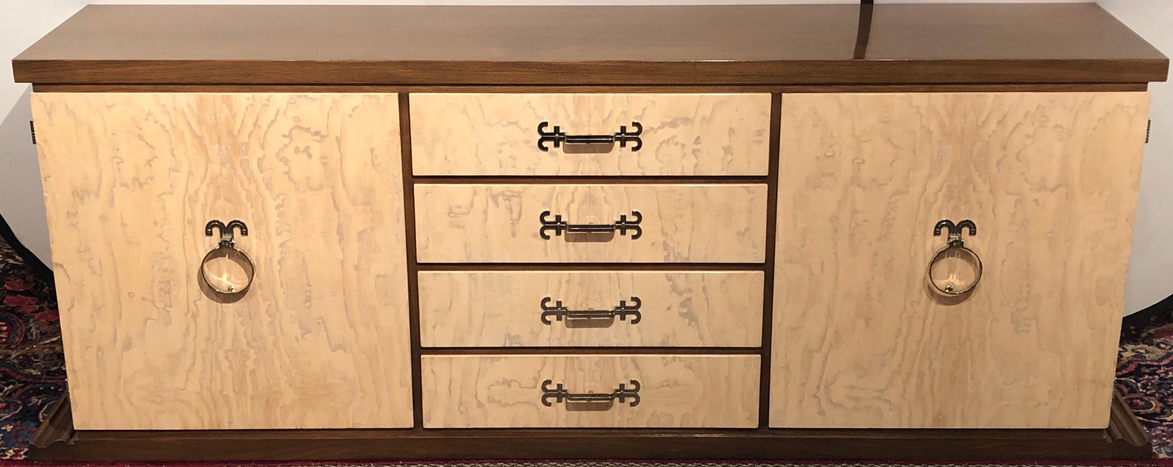 Large and impressive is this Tommi Parzinger spectacular sideboard / credenza branded Tommi Parzinger Originals. This rich lacquered walnut and whitewashed with lacquered burl cabinet is simply stunning and in wonderful condition. The case itself