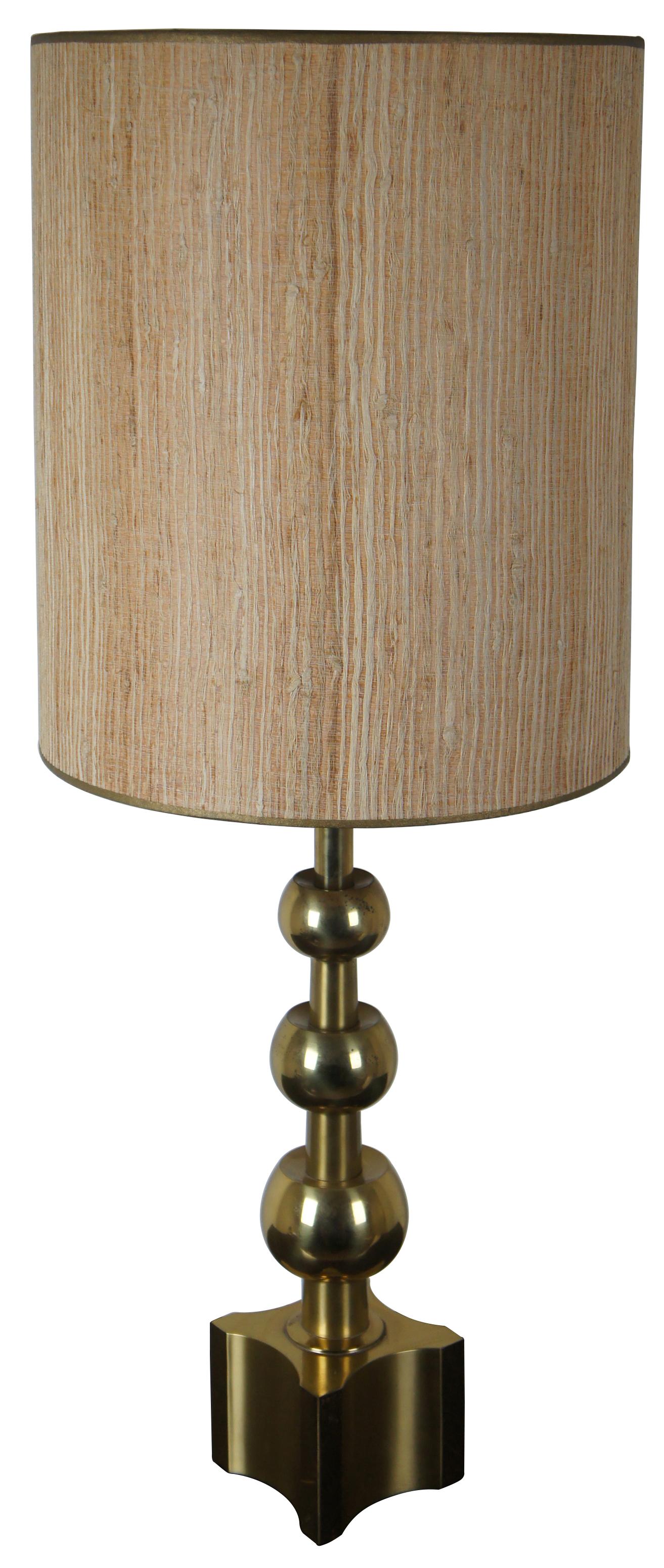 Vintage midcentury Stiffel brass three stack bauble table lamp designed by Tommi Parzinger.

Measures: Height to top of shade 41.75”, shade 16.25” x 19.25”.
   