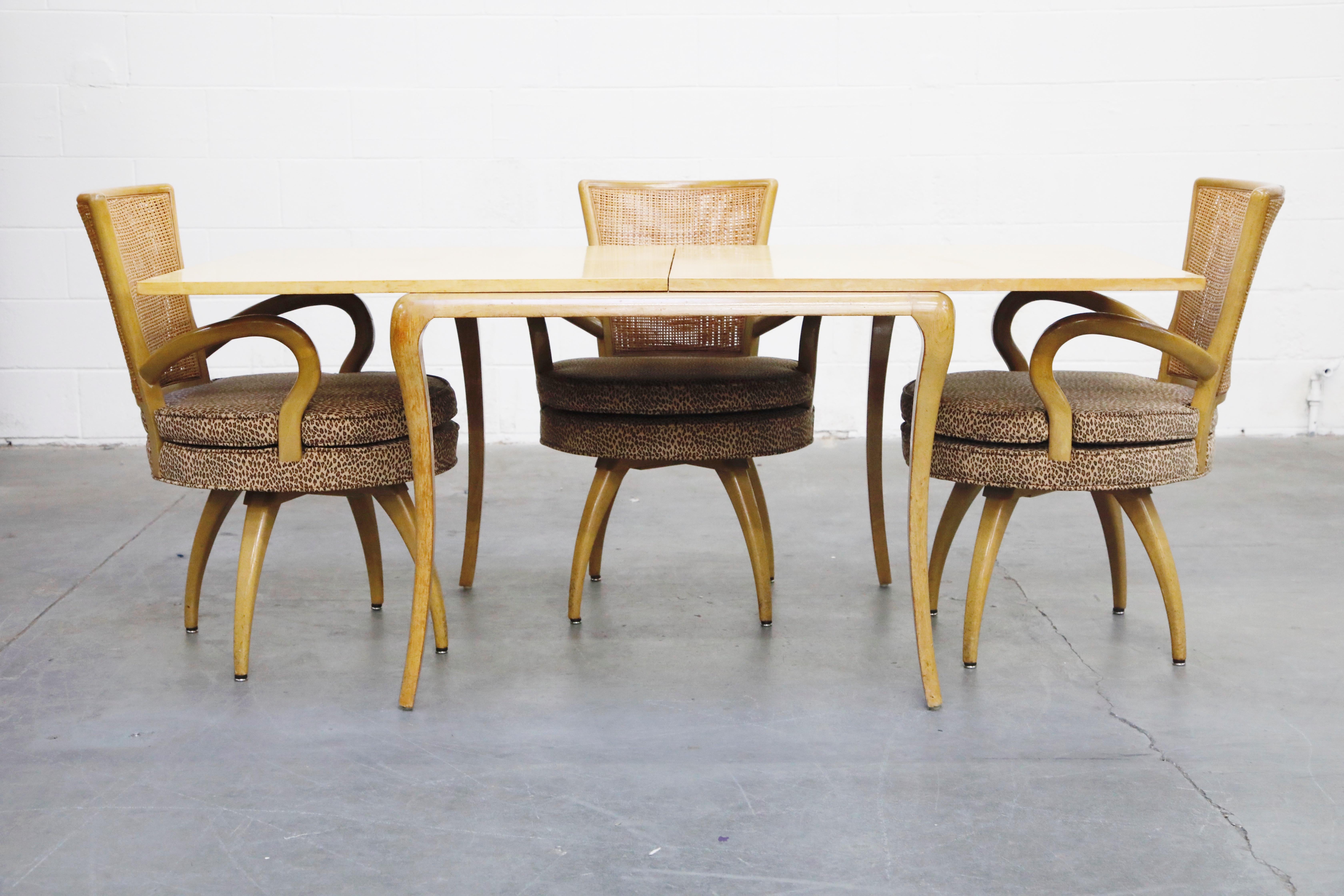 Tommi Parzinger Styled Expandable Dining Table and Swivel Chairs, circa 1950s In Good Condition In Los Angeles, CA