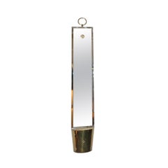 Tommi Parzinger wall mirror brass sconce planter.