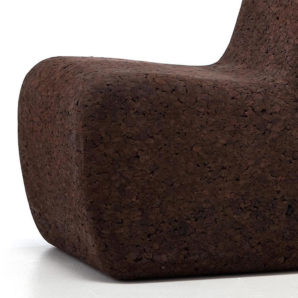 Armchair Tommy with all structure 
in cork in brown finish.