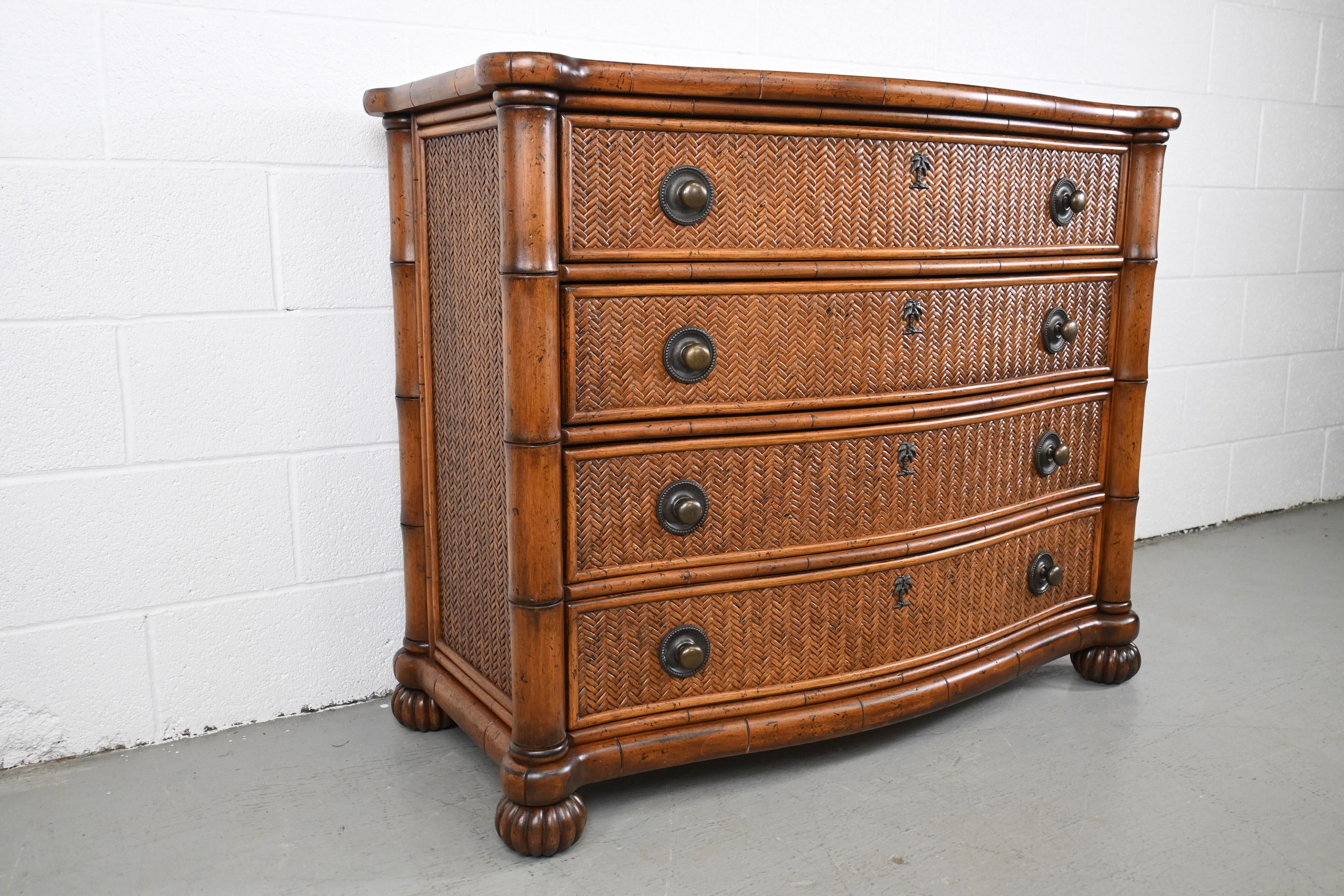 Tommy Bahama Faux Bamboo Four Drawer Dresser

Lexington Furniture, 2000s

Measures: 44 Wide x 21.5 Deep x 35.75 High

Faux bamboo dresser with woven front and Tommy Bahama palm tree escutcheon on each of the four drawers with purposefully