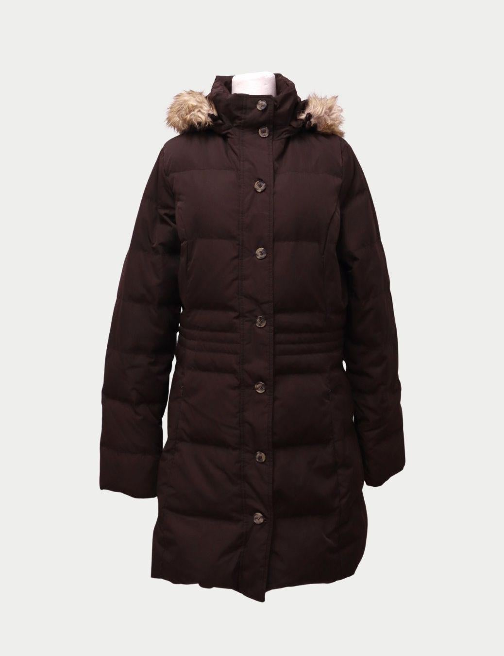 Tommy Hilfiger Brown Long Puffer Coat with Faux-Fur Hood – Warm Winter Jacket

Stay warm in style with this Tommy Hilfiger long brown puffer coat, designed for ultimate comfort and classic winter protection.

This insulated coat features a sleek