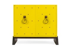 Tommy Parzinger Yellow Lacquered Studded Two-Door Cabinet, USA 1950s