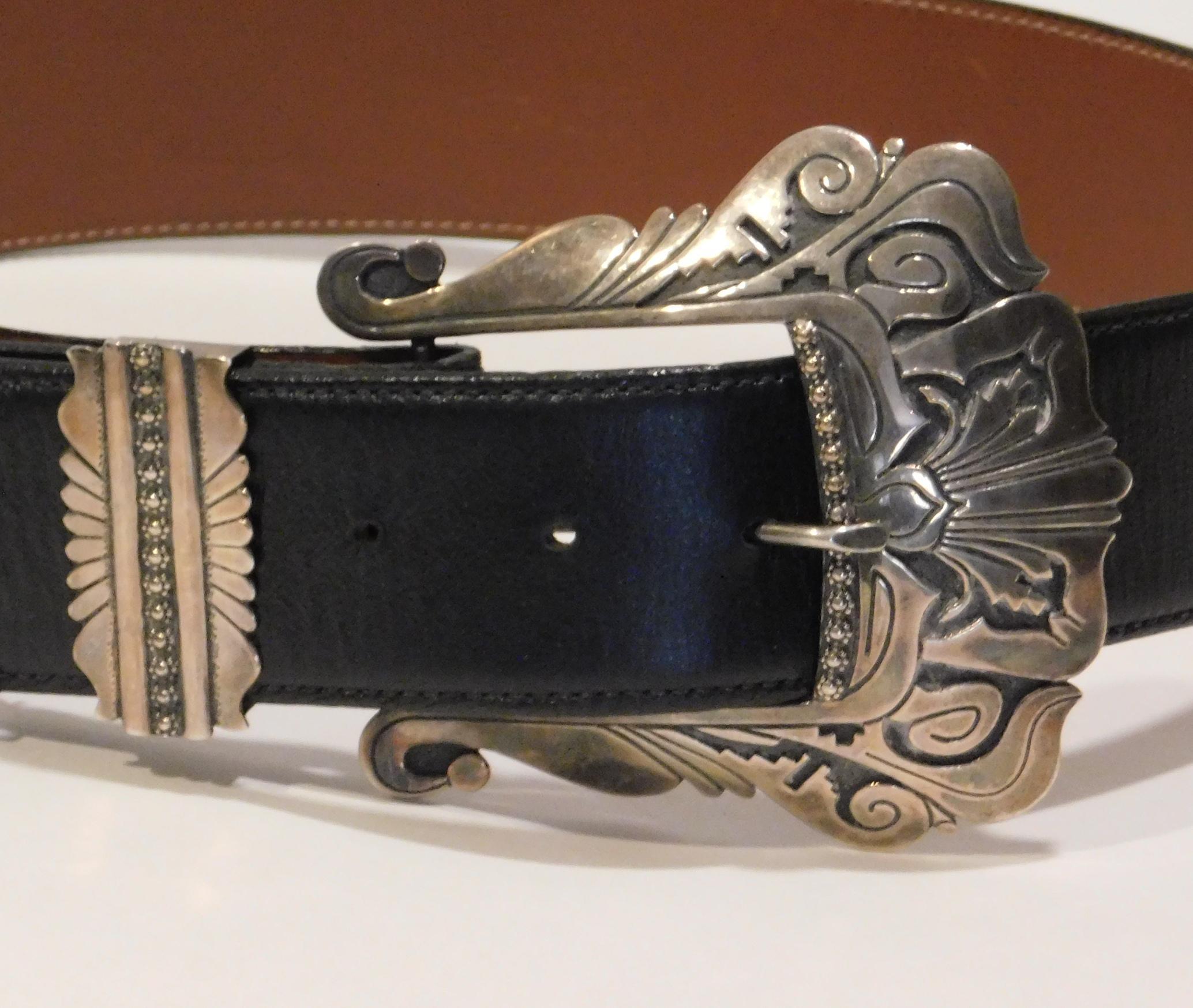 Tommy Singer Navajo Sterling Ranger Set - Buckle, Keep and Tip
This large beautifully crafted buckle set was made circa 1980's. 
It is in excellent condition and signed 