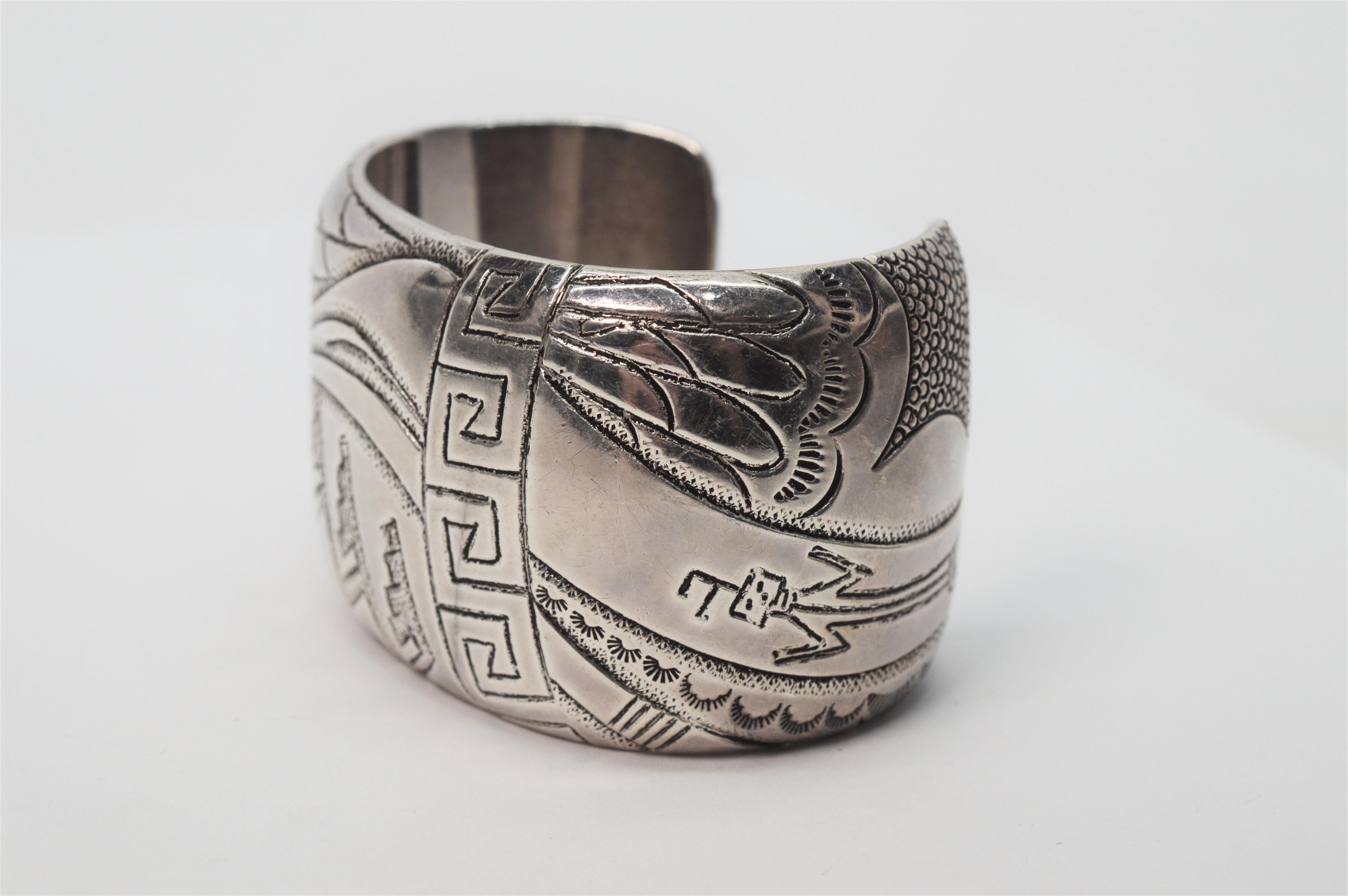 High quality sterling silver wide cuff bracelet made by renown Navajo silversmith, Thomas 