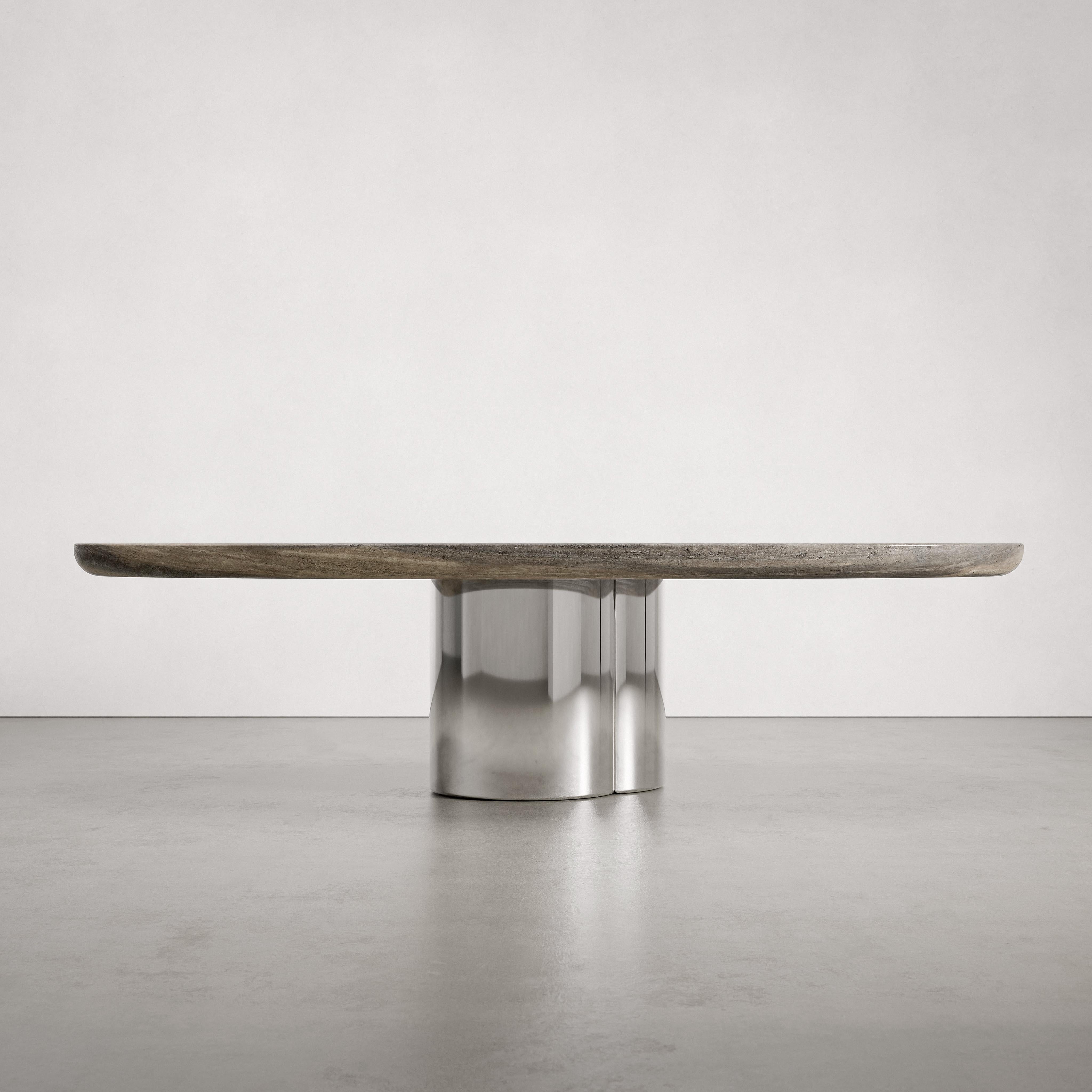 Table de salle à manger Tomoon 2.0 par Verena Brausch
Dimensions : D 130 x L 290 x H 75 cm.
MATERIAL : Travertin argenté, acier inoxydable.

Verena Brausch apporte une énergie nouvelle et un objectif singulier. Sa principale motivation vient de son