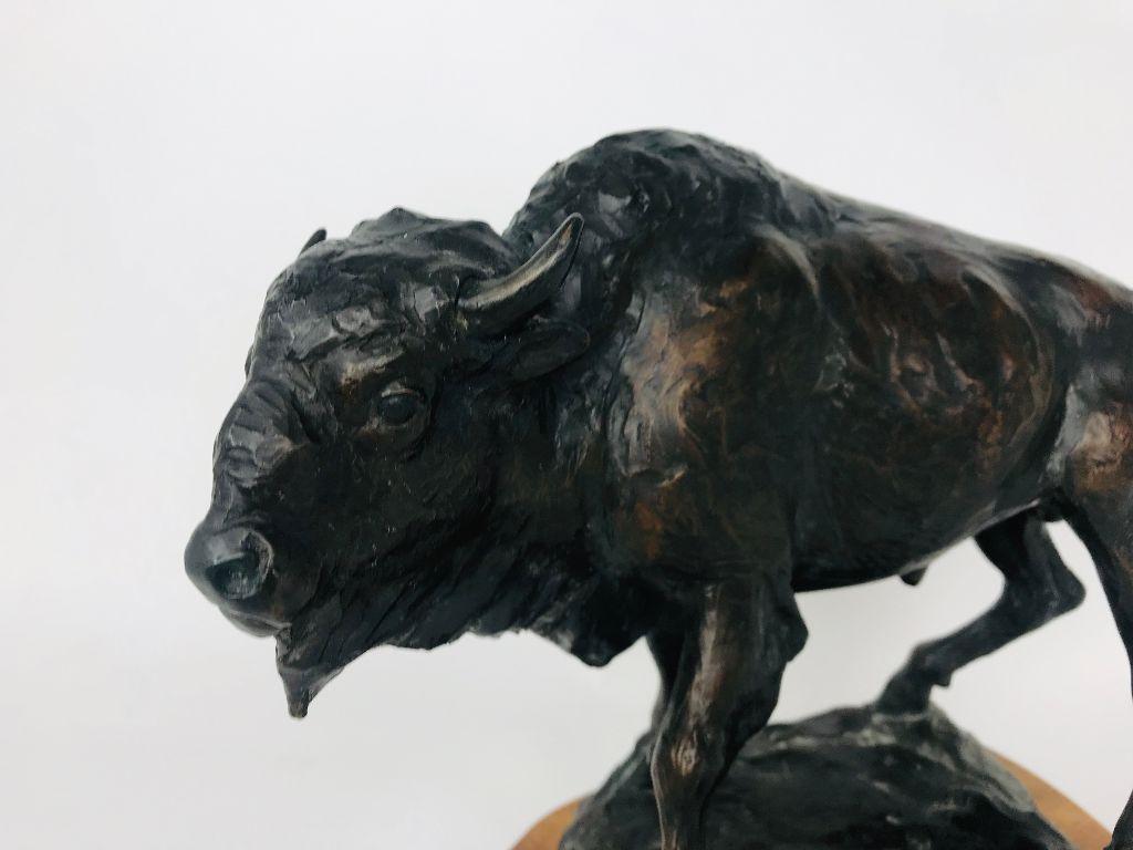 This is a bronze of an American Bison titled 