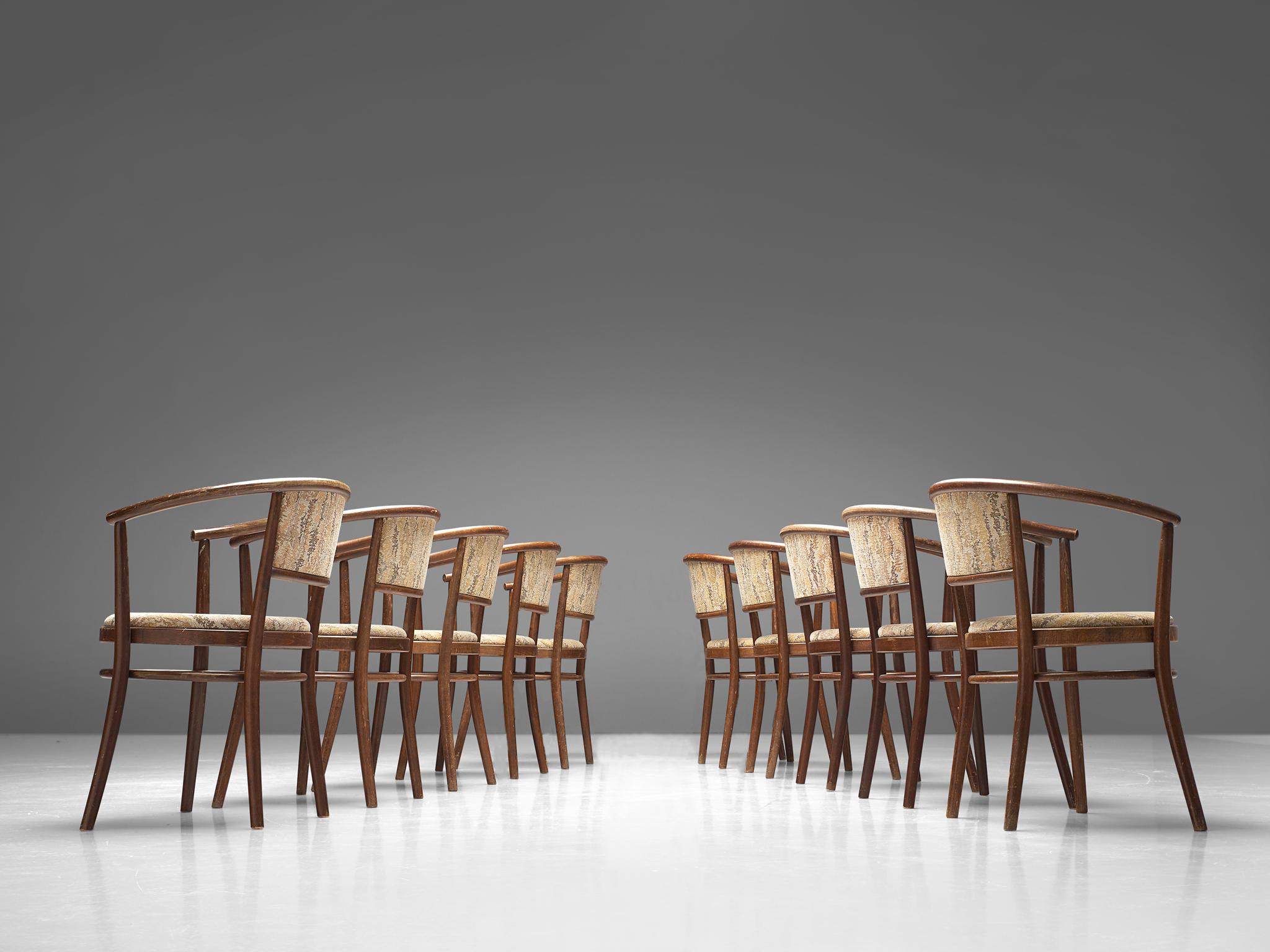 Ton, set of armchairs, bentwood, fabric upholstery, beech, Czech Republic, 1960s

This elegant set of dining chairs, manufactured by Ton, features a wonderful bentwood frame. The round shape of the backrest surrounds the user. The seat and backrest
