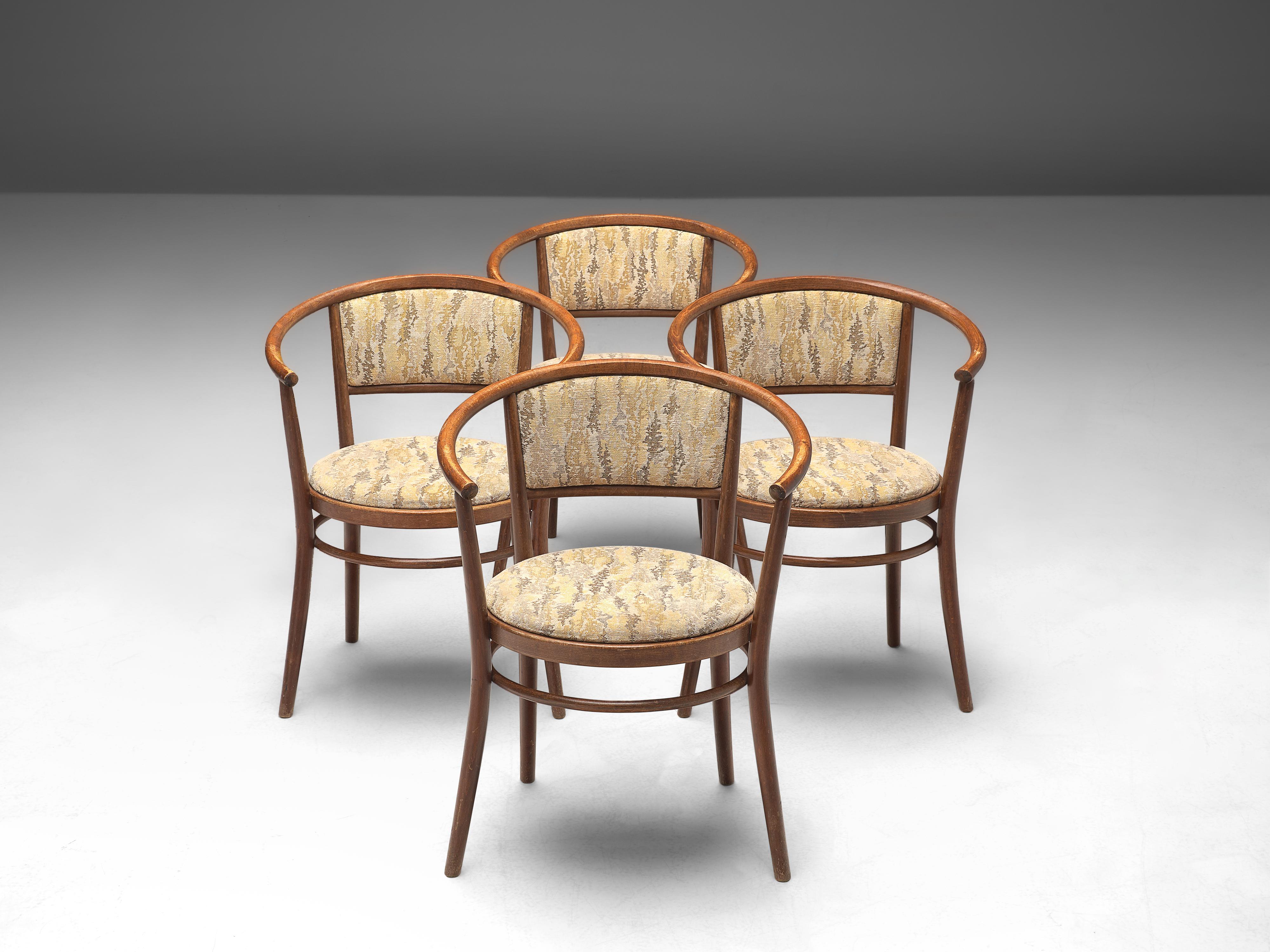 Ton, armchairs, bentwood, fabric upholstery, beech, Czech Republic, 1960s

These elegant dining chairs, manufactured by Ton, features a wonderful bentwood frame. The round shape of the backrest surrounds the user. The seat and backrest are