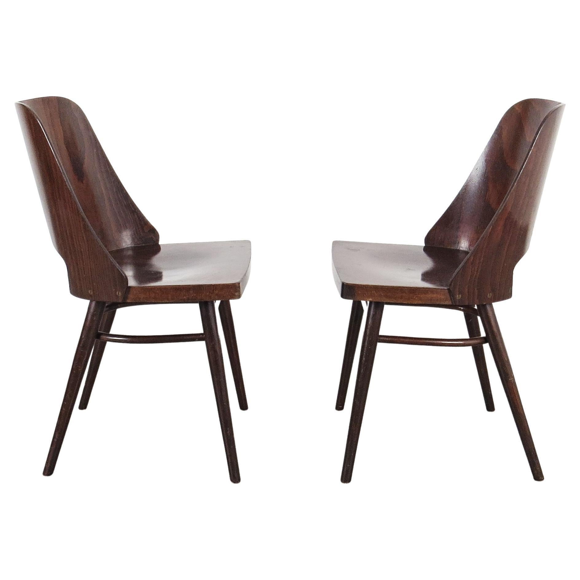 Czechoslovakian Mid-Century Modern manufactured by Ton. The chair pair dates from the 1960s.
 
