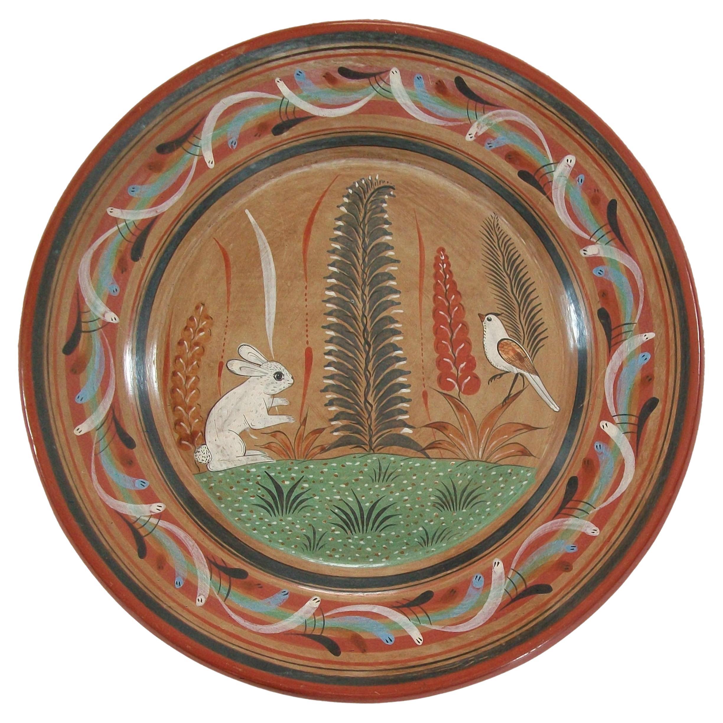 Assiette de présentation en poterie d'art populaire Tonala, lapin peint à la main, Mexique, vers les années 1970