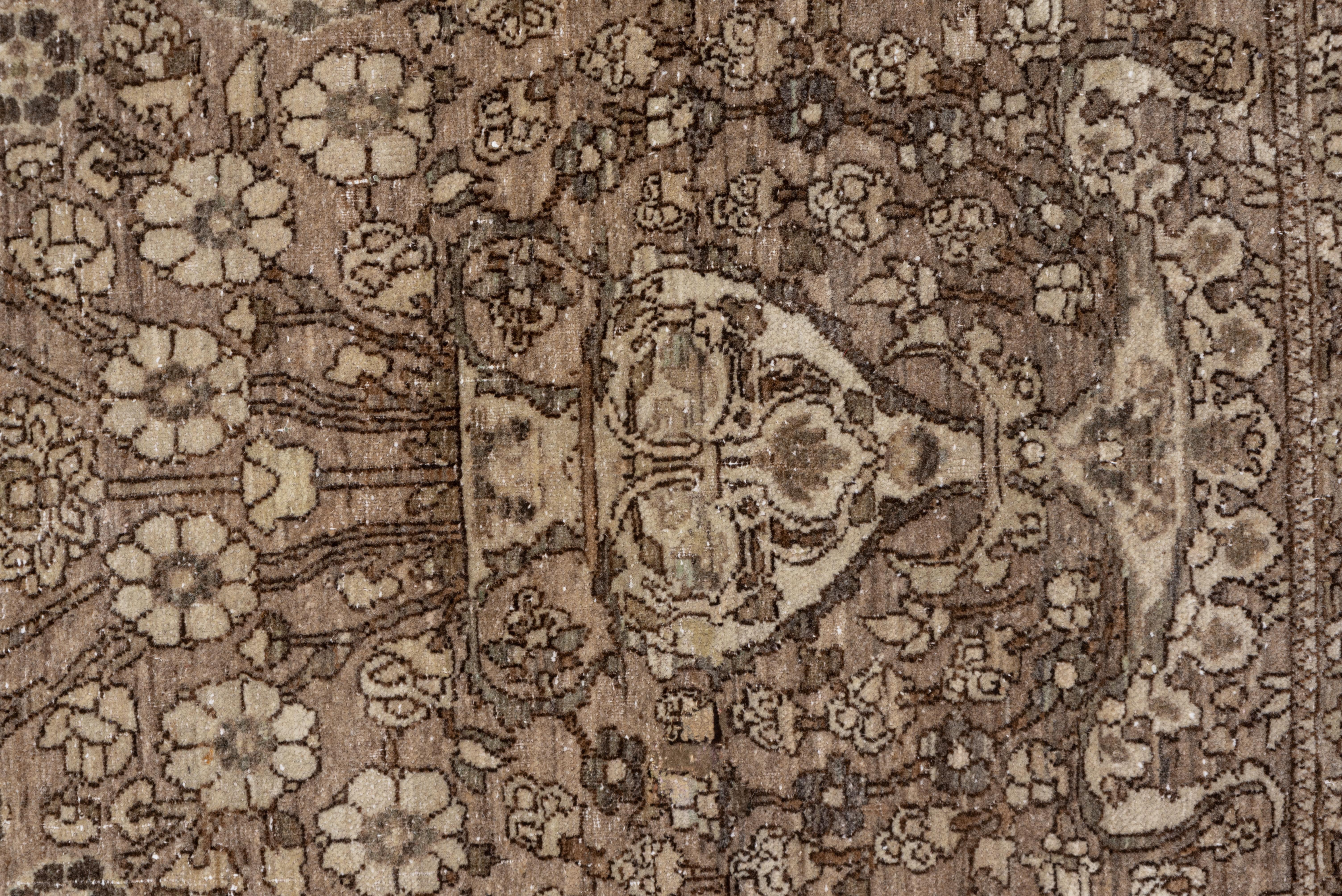 Hand-Knotted Tone on Tone Antique Brown Persian Isfahan Rug, Allover Floral Field, circa 1920