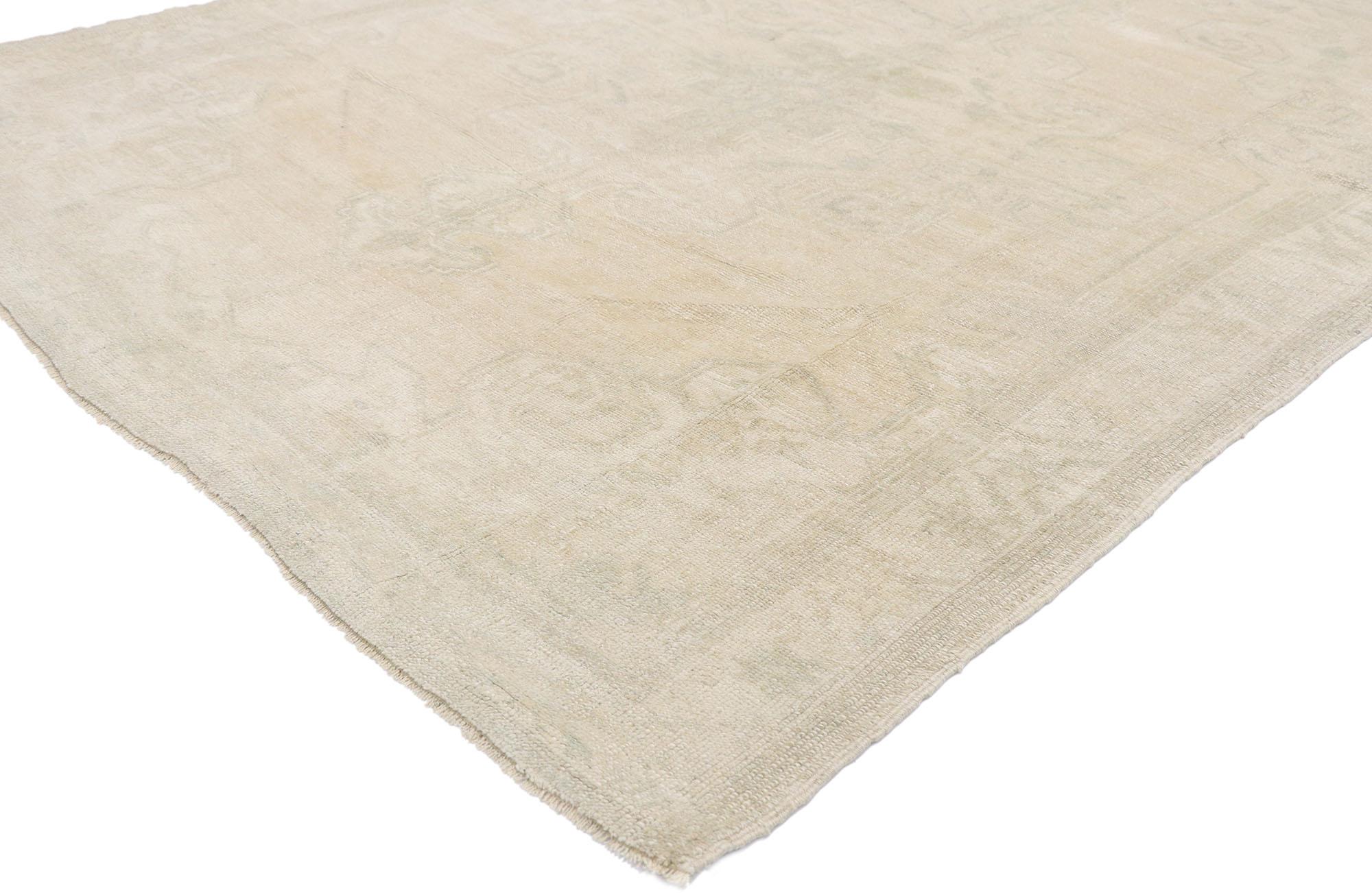 53558 Vintage Turkish oushak rug, 05.02 x 06.11.
With its simplicity, incredible detail and texture, this hand knotted wool vintage Turkish Oushak rug charms with ease. The barely-there geometric pattern and muted colorway woven into this piece