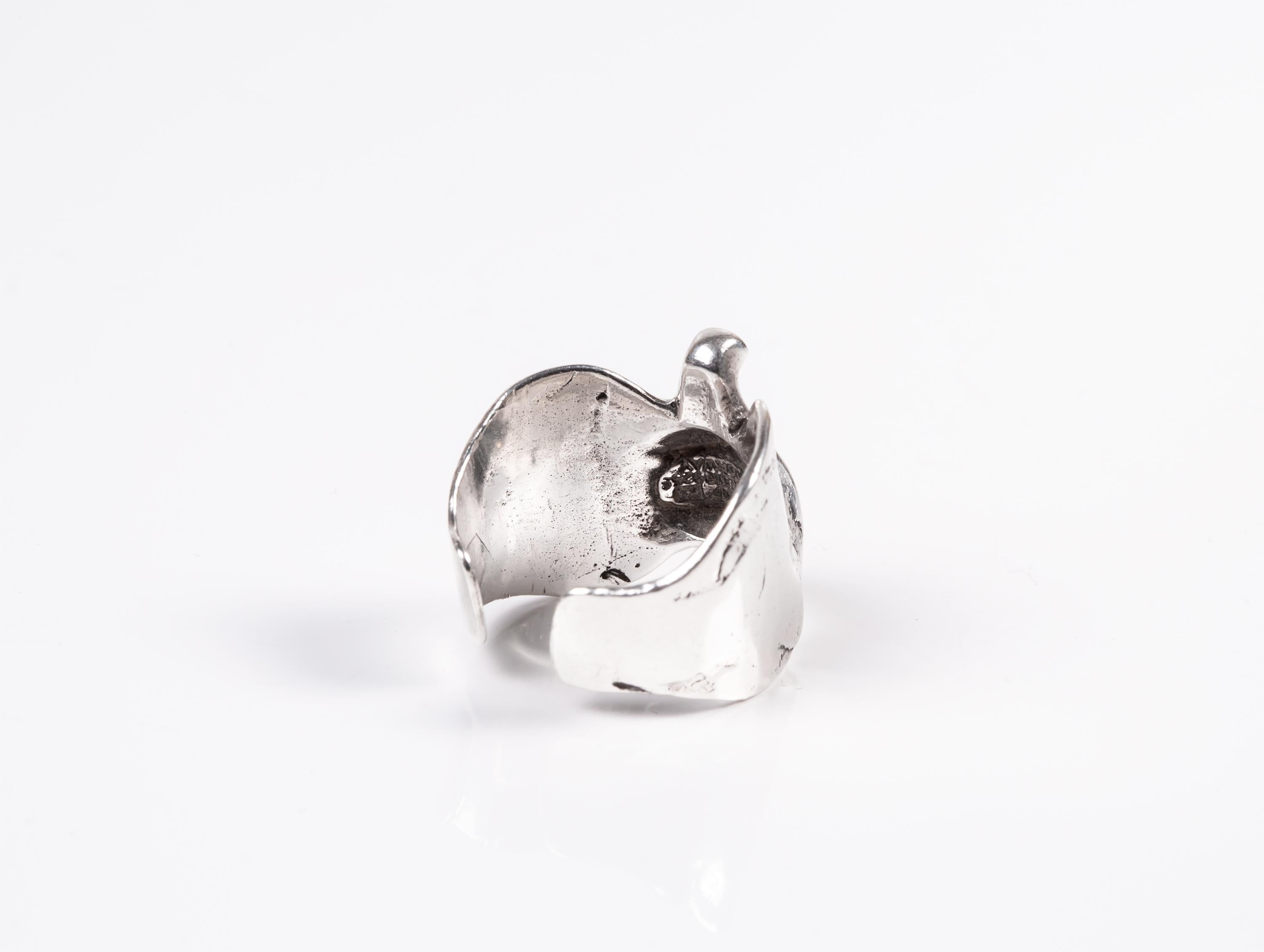 Alluring silver ring by Norwegian silversmith Tone Vigeland. Very rare piece, designed and made for PLUS, Norway designs. Figurative depiction of a swan or the head of an elephant The ring is in very good vintage condition. 