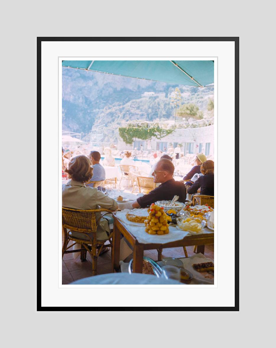 A Beachside Meal In Capri

1959

Holidaymakers enjoy a meal at a beachside restaurant in Capri, Italy, 1959.

by Toni Frissell

12x16 inches / 30x 41 cm paper size 
Archival pigment print
unframed 
(framing available see examples - please enquire)