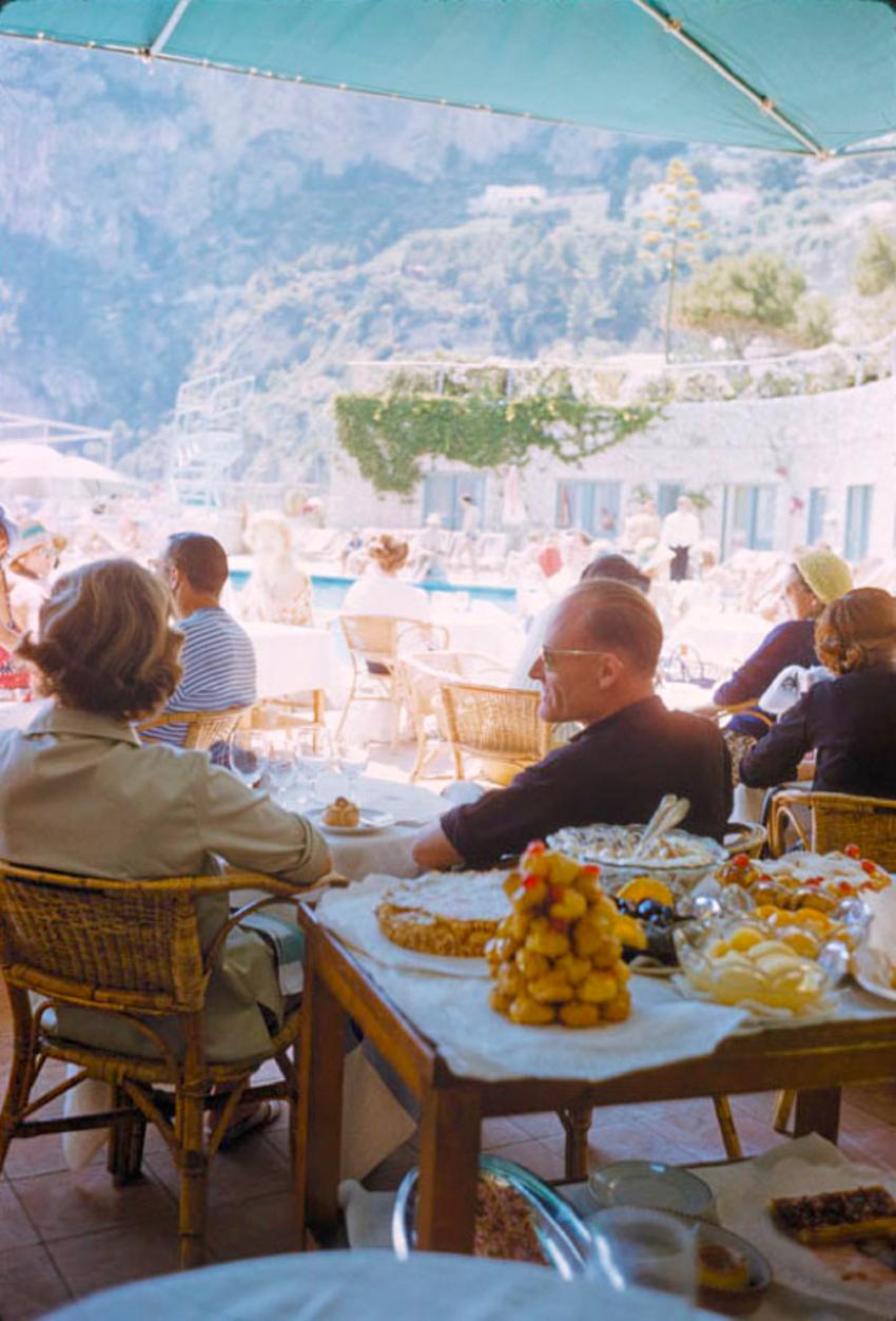 Toni Frissell Color Photograph - A Beachside Meal In Capri 1959 Limited Signature Stamped Edition 