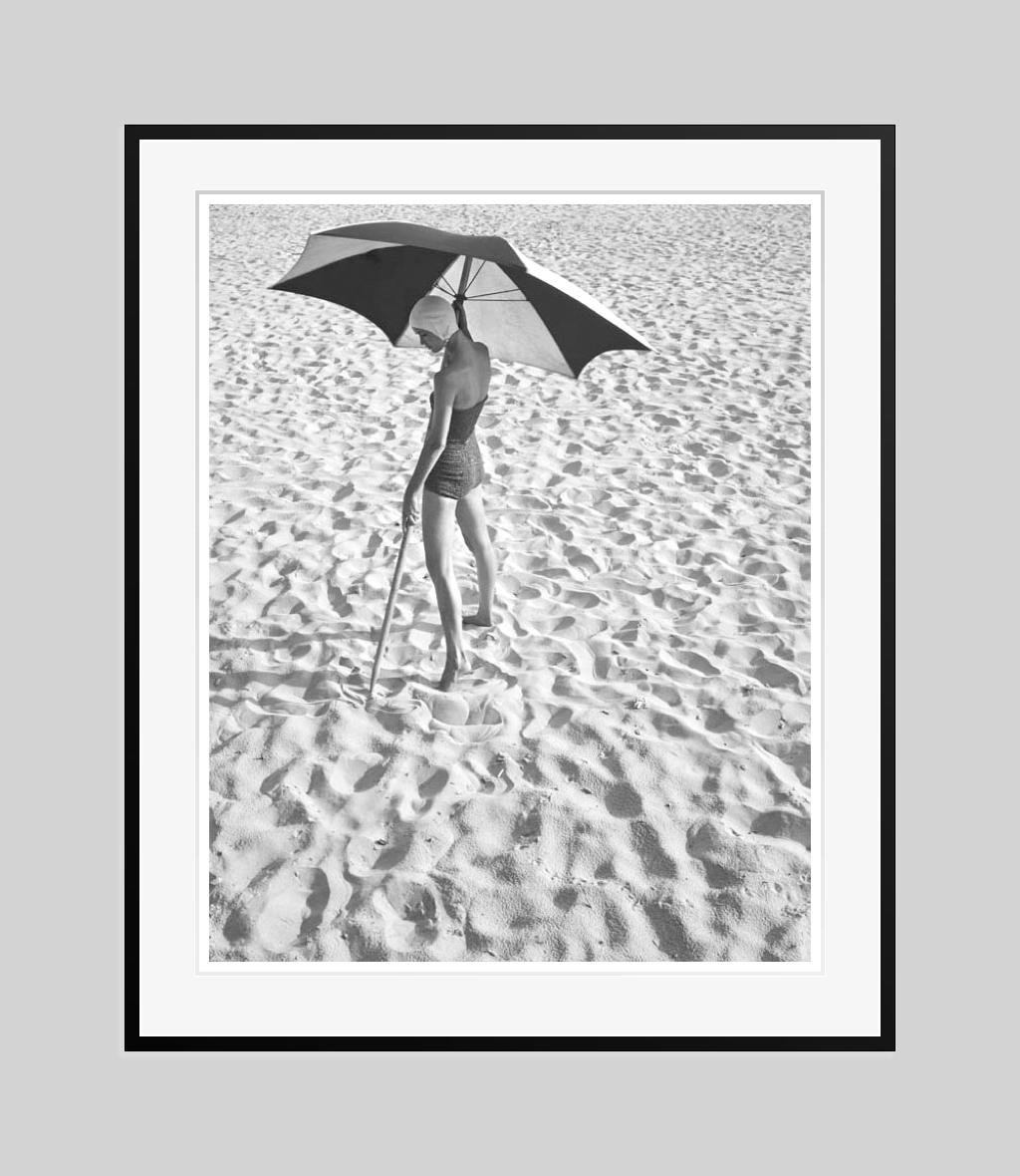 Girl On The Beach 1948 Limited Signature Stamped Edition - Gray Color Photograph by Toni Frissell