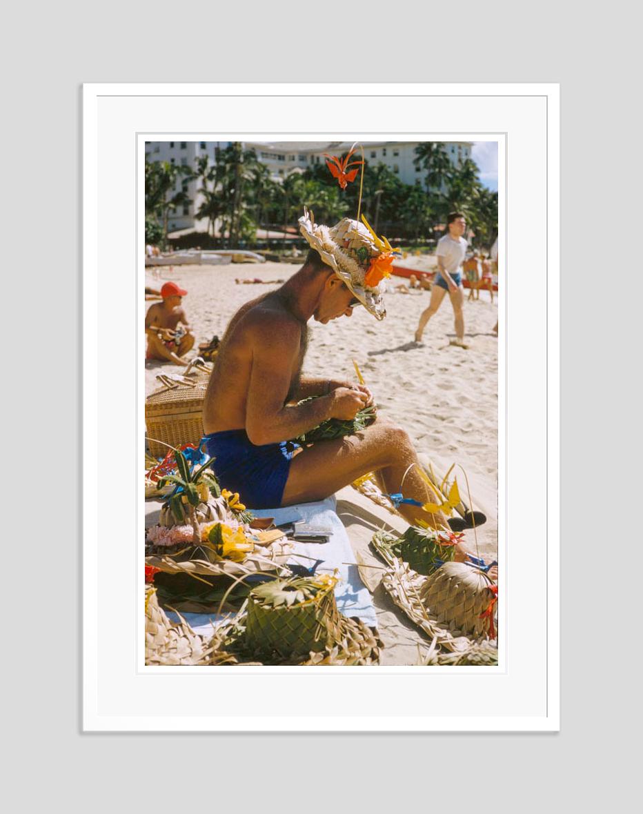 Hawaiian Scenes 

1957

A man weaves sun hats on a Hawaiian beach

by Toni Frissell

40 x 30