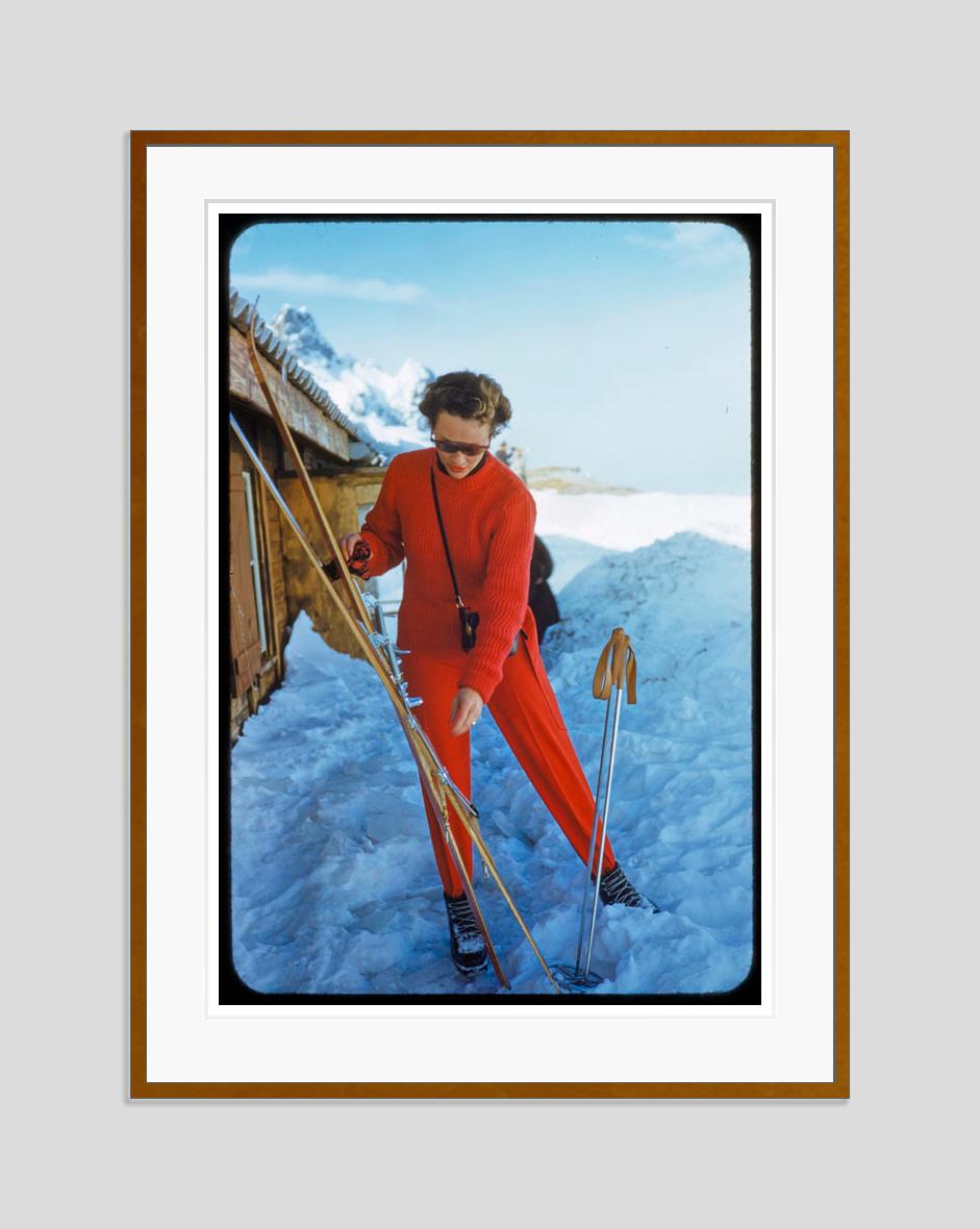 Lady In Red

1955

Woman in in red skiwear preparing her skis, Zermatt, Switzerland, 1955.

by Toni Frissell

40 x 30