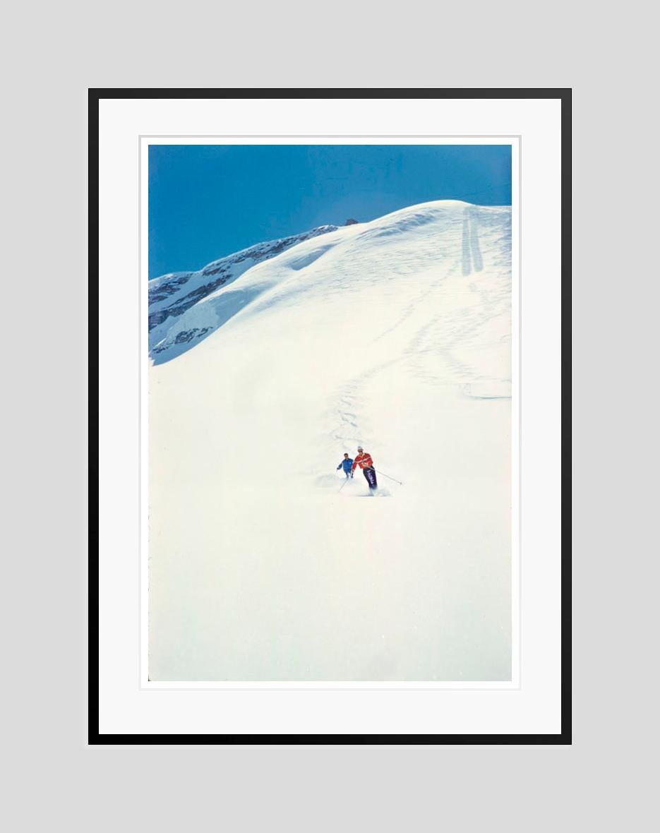 The Perfect Piste 

1960

Two downhill skiers on powder snow, Zermatt, Switzerland, 1960.

by Toni Frissell

30 x 20