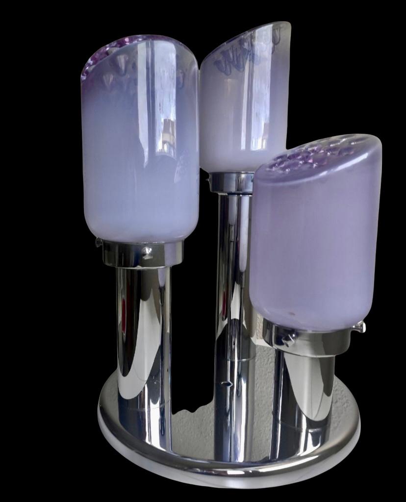 Exceptional Toni Zuccheri sconce large glass Murano with chrome structure . The Design and the quality of the glass make this piece the best of the italian Design .
This unique Sconce  2 units disponible in purple glass murano are exceptional