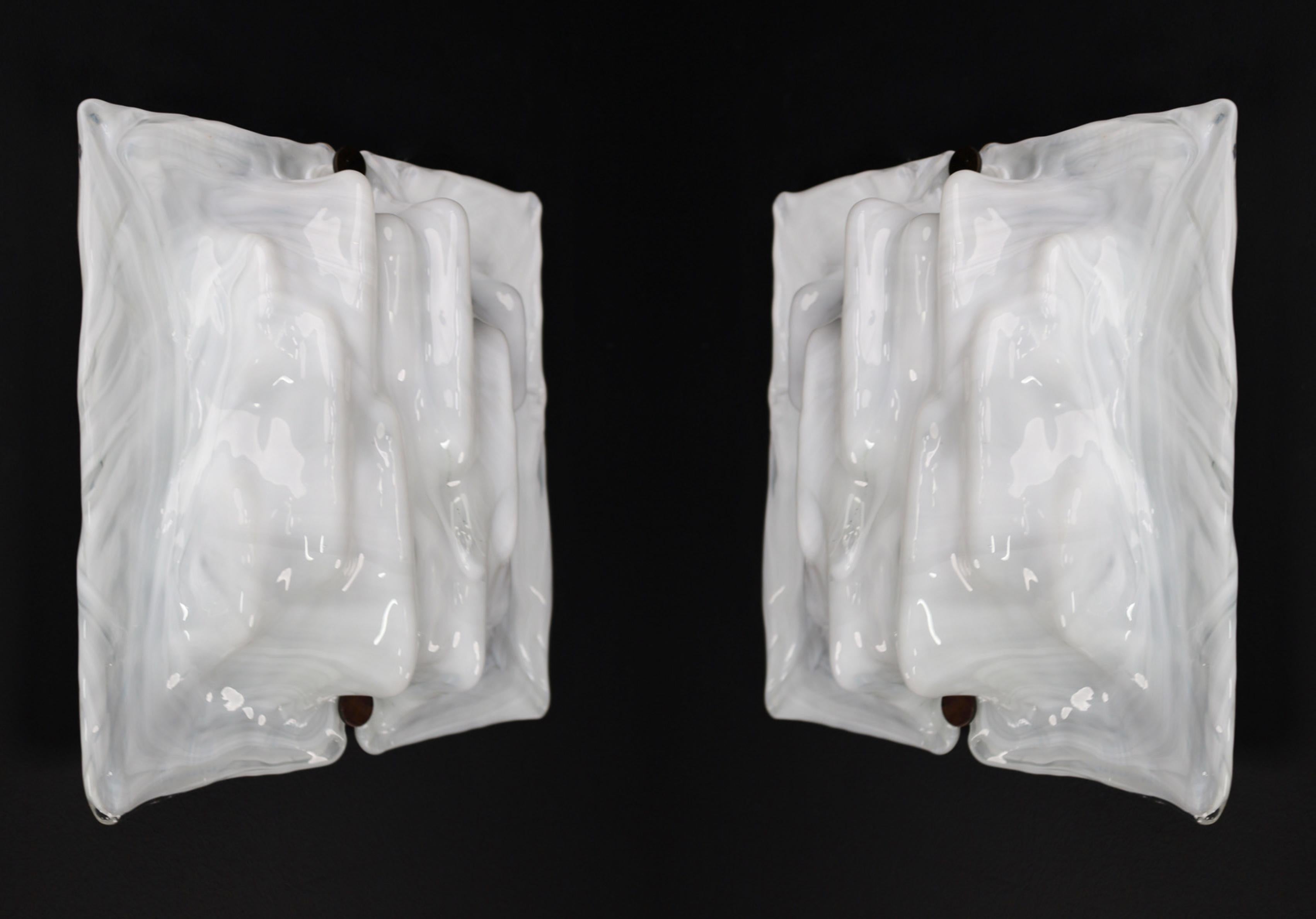 Toni Zuccheri for Venini Murano Glass Sconses, Italy 1970s

Excellent and square Venini white Murano glass applique by Toni Zuccheri made and designed in Italy 1970s. These wall sconces are executed to a very high standard. The Murano glass