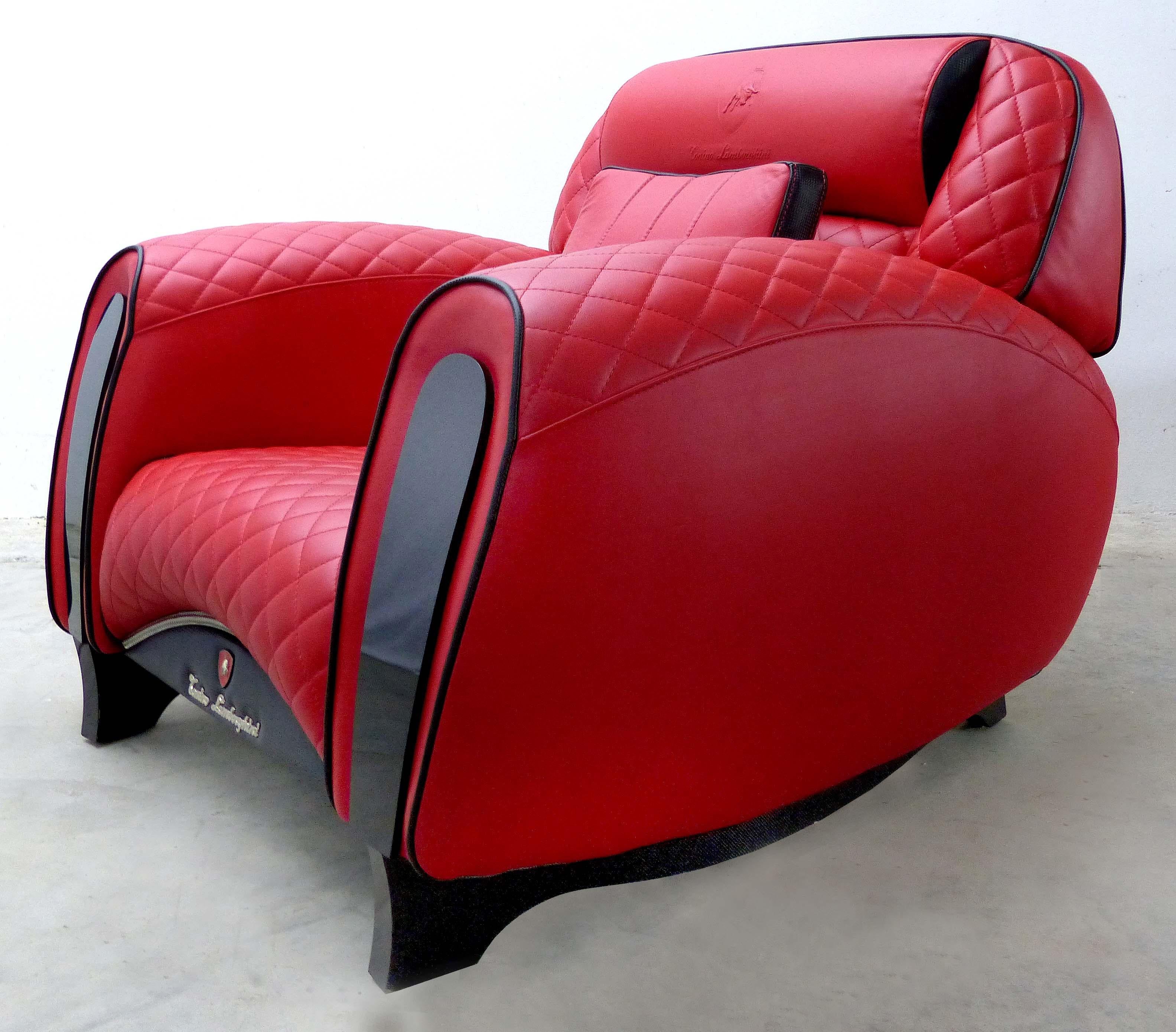 Offered for sale are two carbon Imola armchairs from Italian manufacturer Formitalia for Tonino Lamborghini. Made of leather, carbon, steel, and polyurethane, this incredibly comfortable pair of club chairs have the highest quality supple leather,