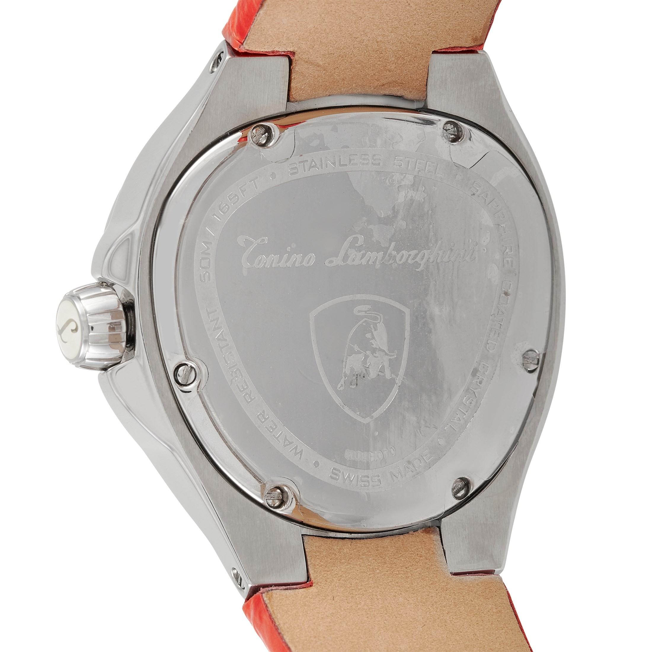 This Tonino Lamborghini Spyder Corsa Lady 702 Stainless Steel 38.30 mm Watch, reference number 702, comes with a gunmetal stainless steel case that measures 38.30 mm in diameter. The case is presented on a red crocodile grain leather strap with