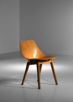 Tonneau chair by pierre guariche from the 60s in solid wood