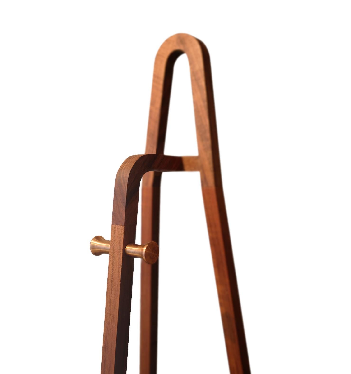 The Tono G Coat Stand is a remarkable addition to the Tono line, crafted from solid wood and featuring the iconic curves that define the collection. This coat stand is designed to seamlessly fit into any space, offering both functionality and a