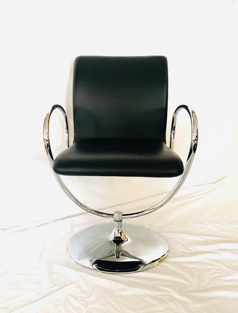 Tonon swivel chair 
Leather and stainless steel
Measures: H: 89
L: 56 
H sitting 44 
Circa 2000
Perfect condition 
1950 euros for 4 chairs 
8 available.