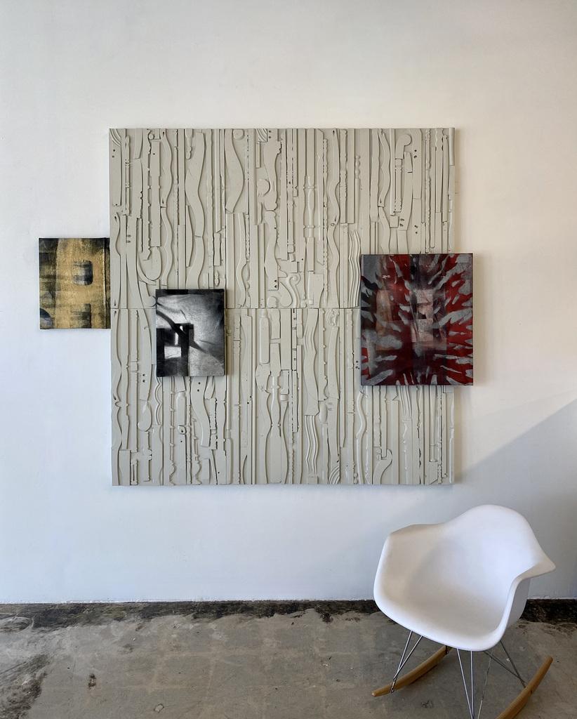 Tony brown is an abstract artist who uses recyslced materials to create amazing works of art. This Large work is recycled wood and is painted with white acrylic paint. It is made up of 6 smaller pieces that are 35.5H x 23W and can be sold seperately
