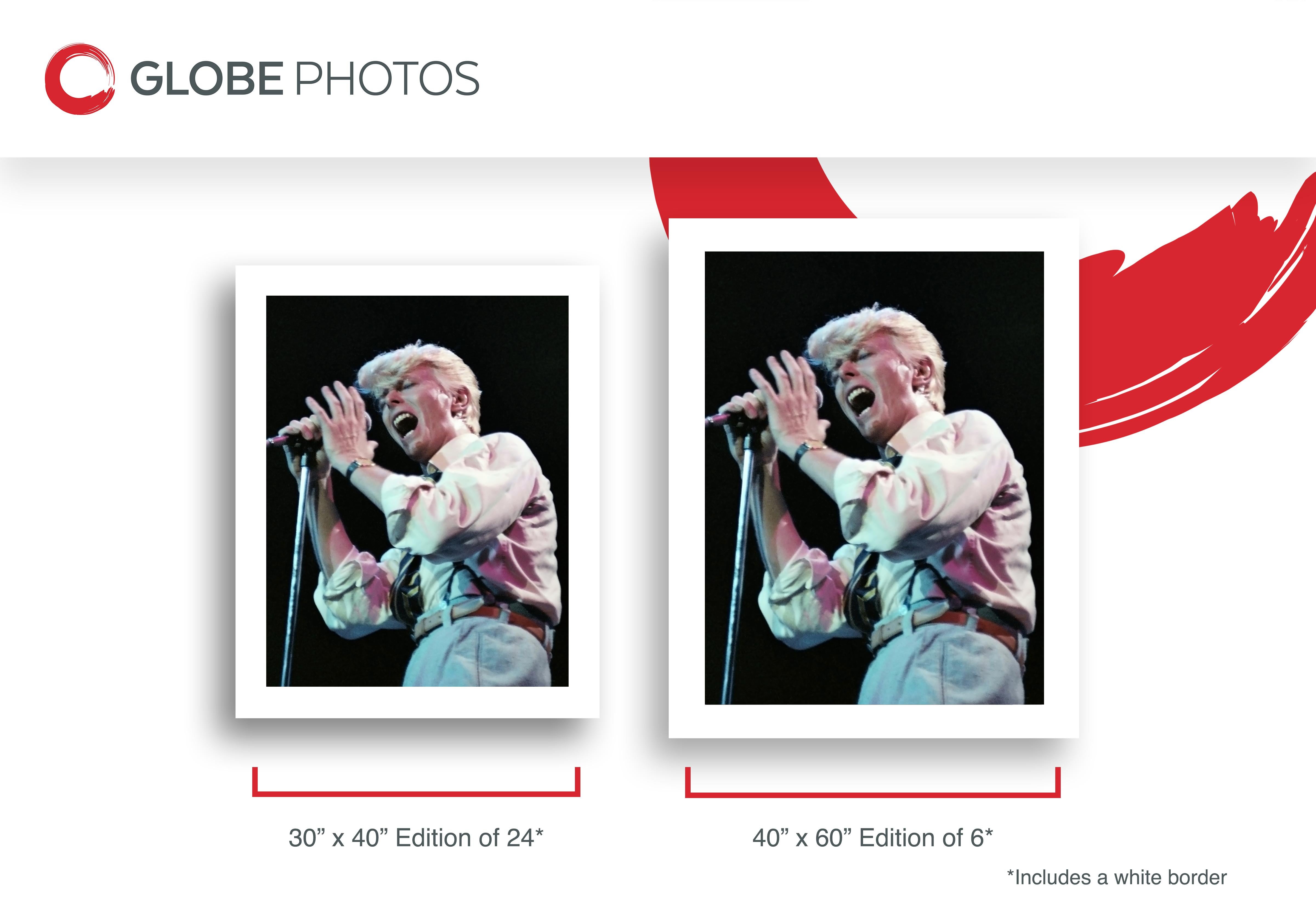 This color action portrait features singer and musician David Bowie on stage during his 