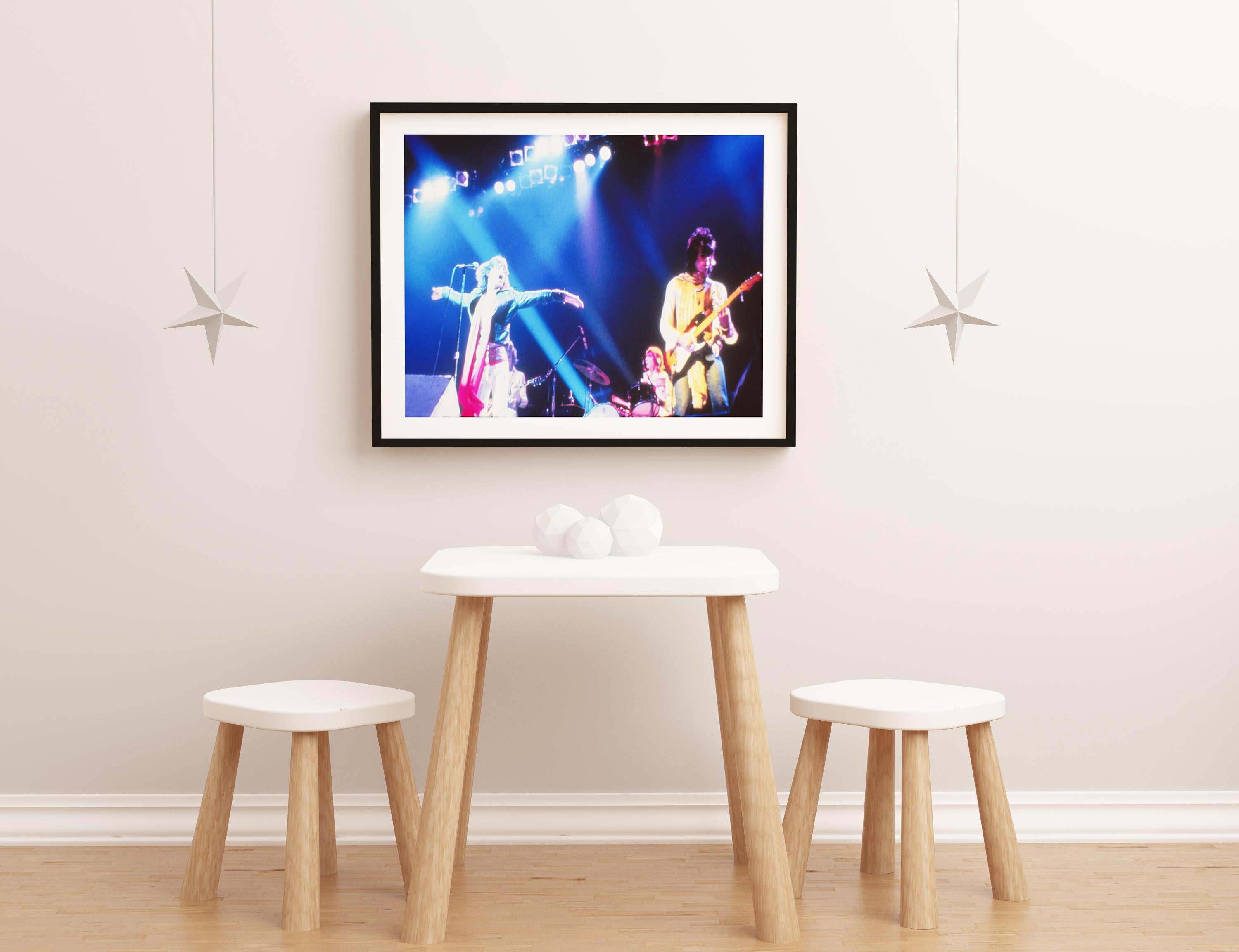 This color action shot features English rock band formed in London, England, The Rolling Stones. The Rolling Stones were at the forefront of the British Invasion of bands that became popular in the United States in 1964 and were identified with the
