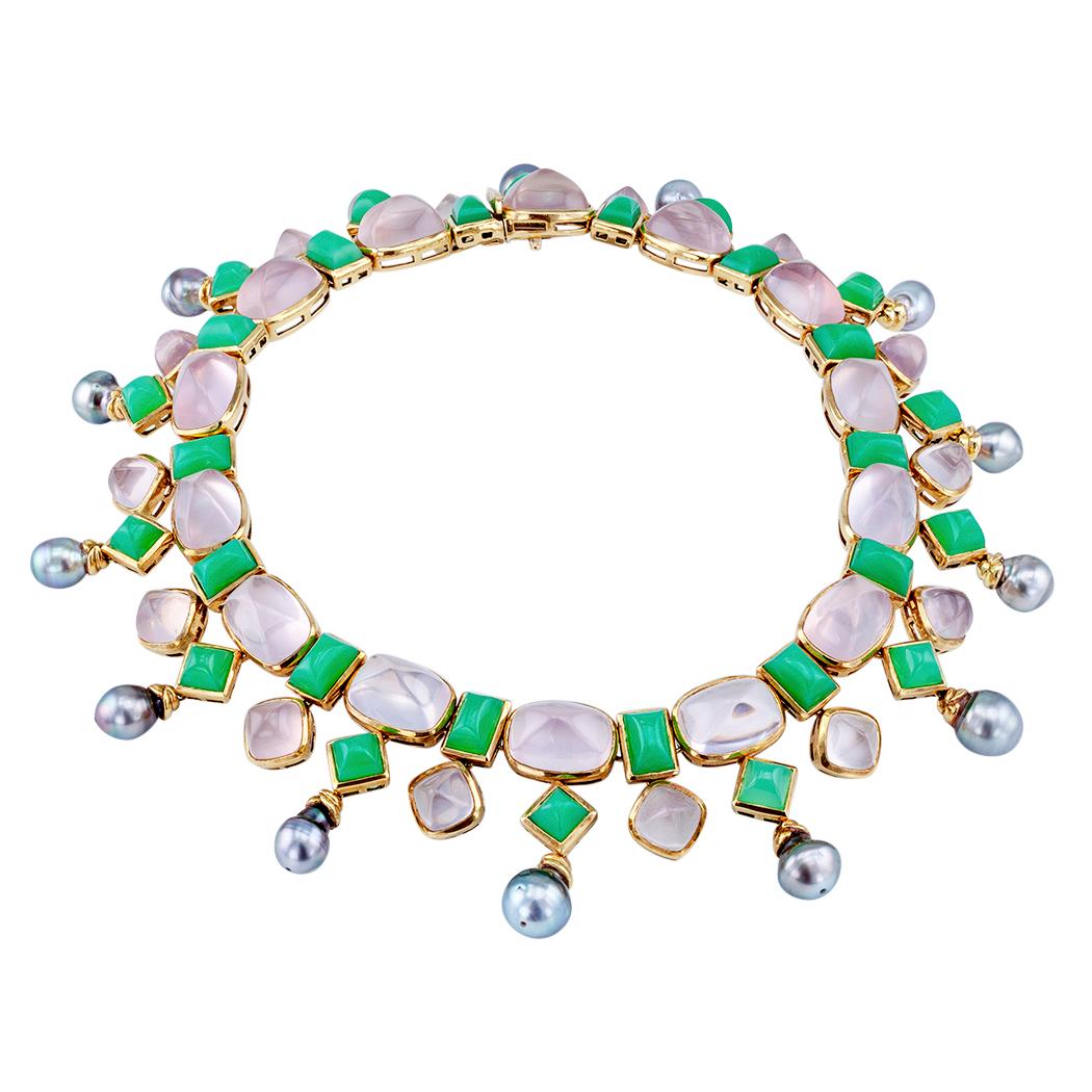 Tony Duquette chrysoprase rose quartz Tahitian pearls and yellow gold necklace. *

This Tony Duquette Chrysoprase Rose Quartz Tahitian Pearl Yellow Gold Necklace is a stunning piece of jewelry that embodies elegance and sophistication. Crafted with